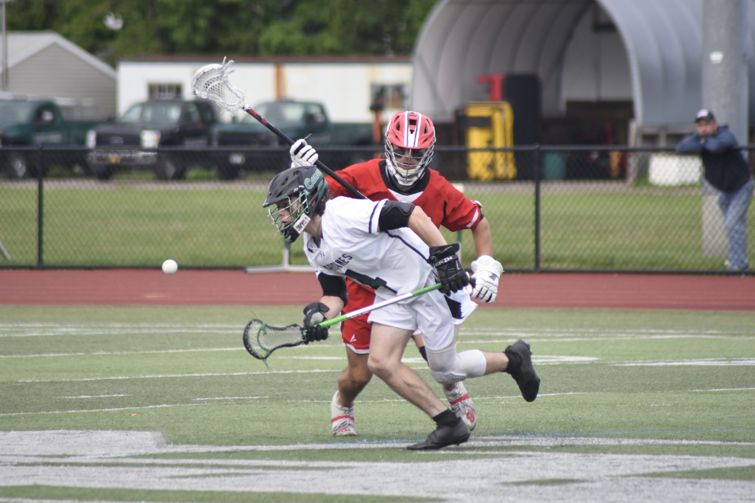 Westhampton Beach sophomore Nolan Michalowski chases after a loose ball off a draw.   DREW BUDD