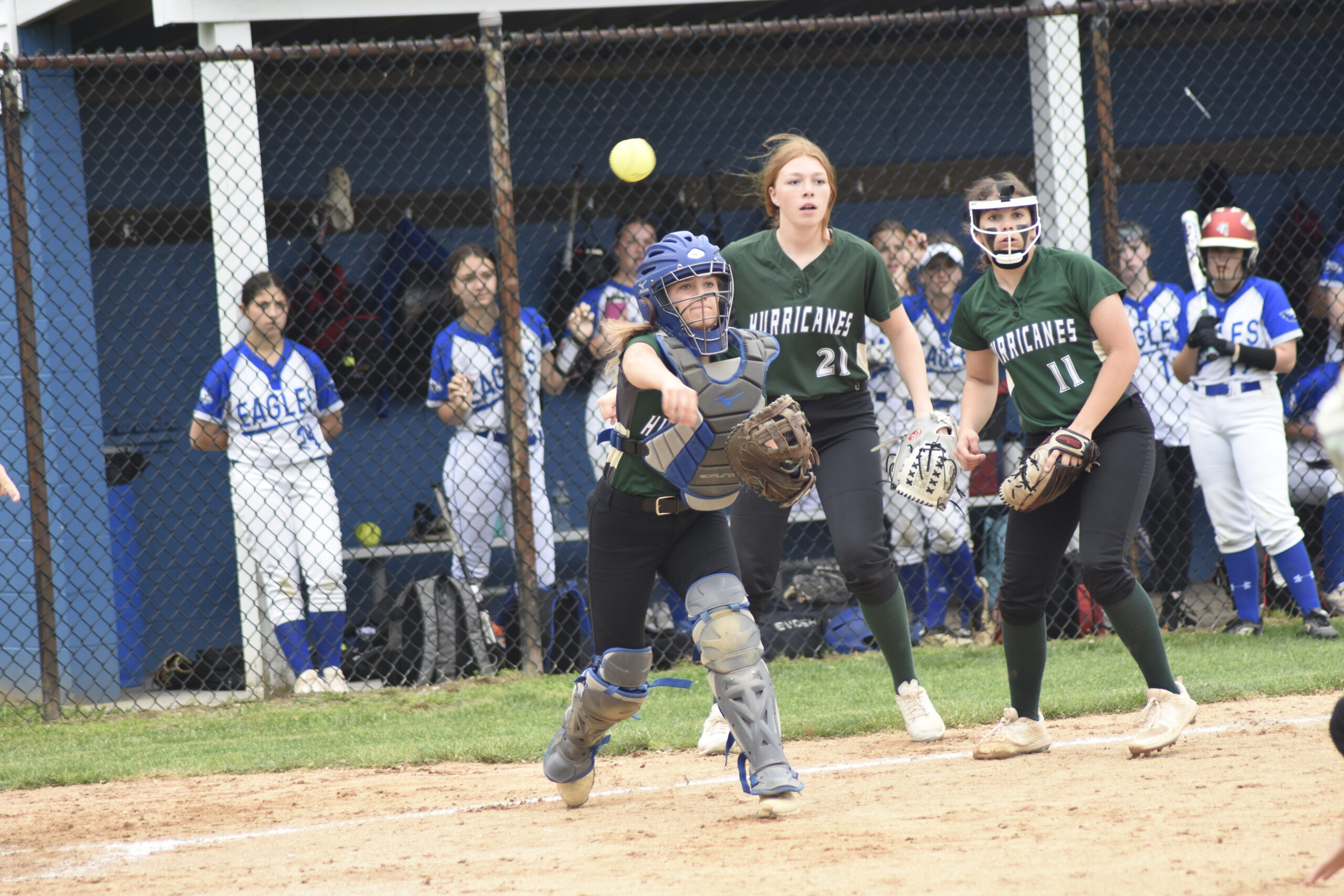 Westhampton Beach senior catcher Lillie Henthorne fires to first base for an out.   DREW BUDD