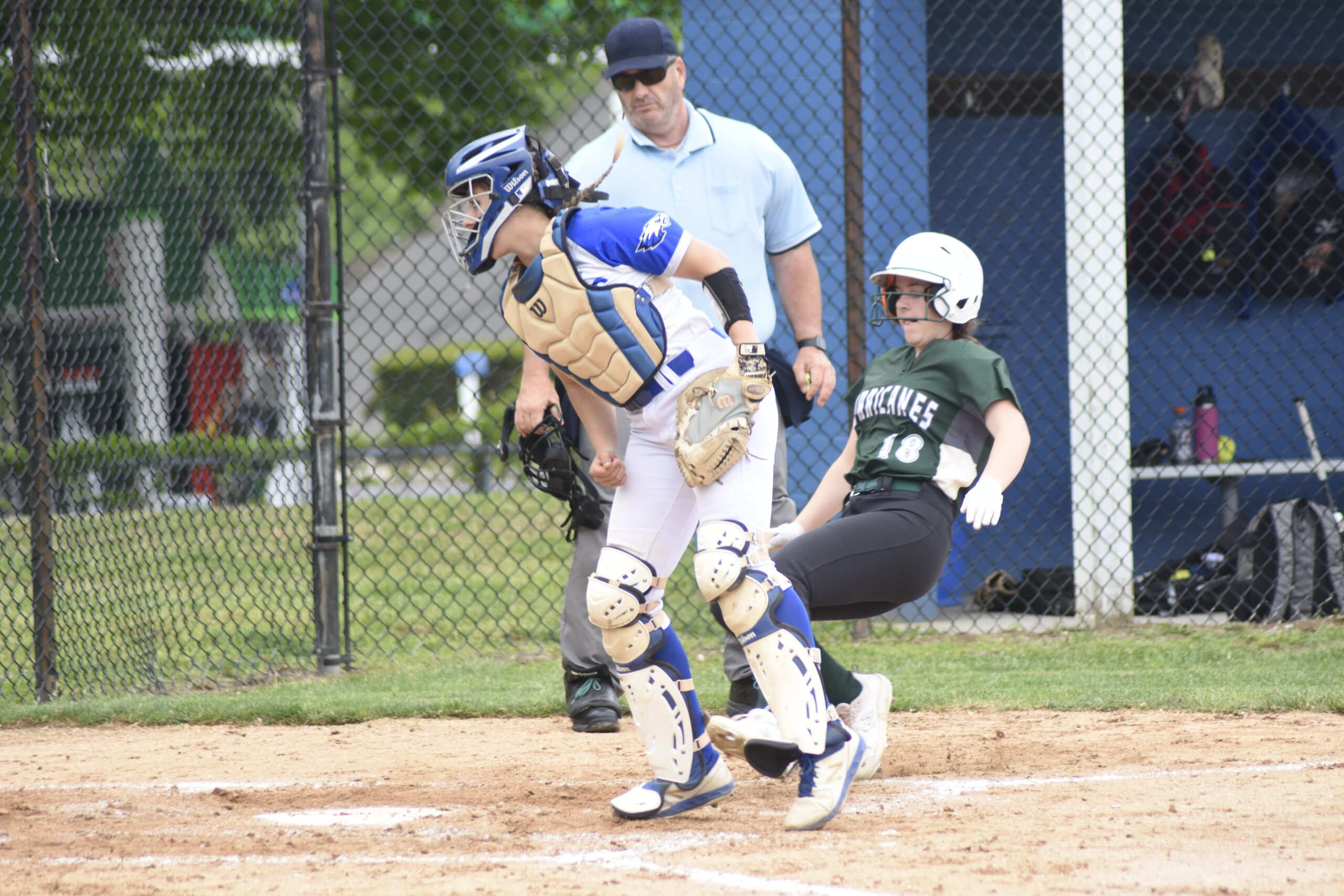 Kali Baumiller gets ready to slide at home plate for a Westhampton Beach run.   DREW BUDD