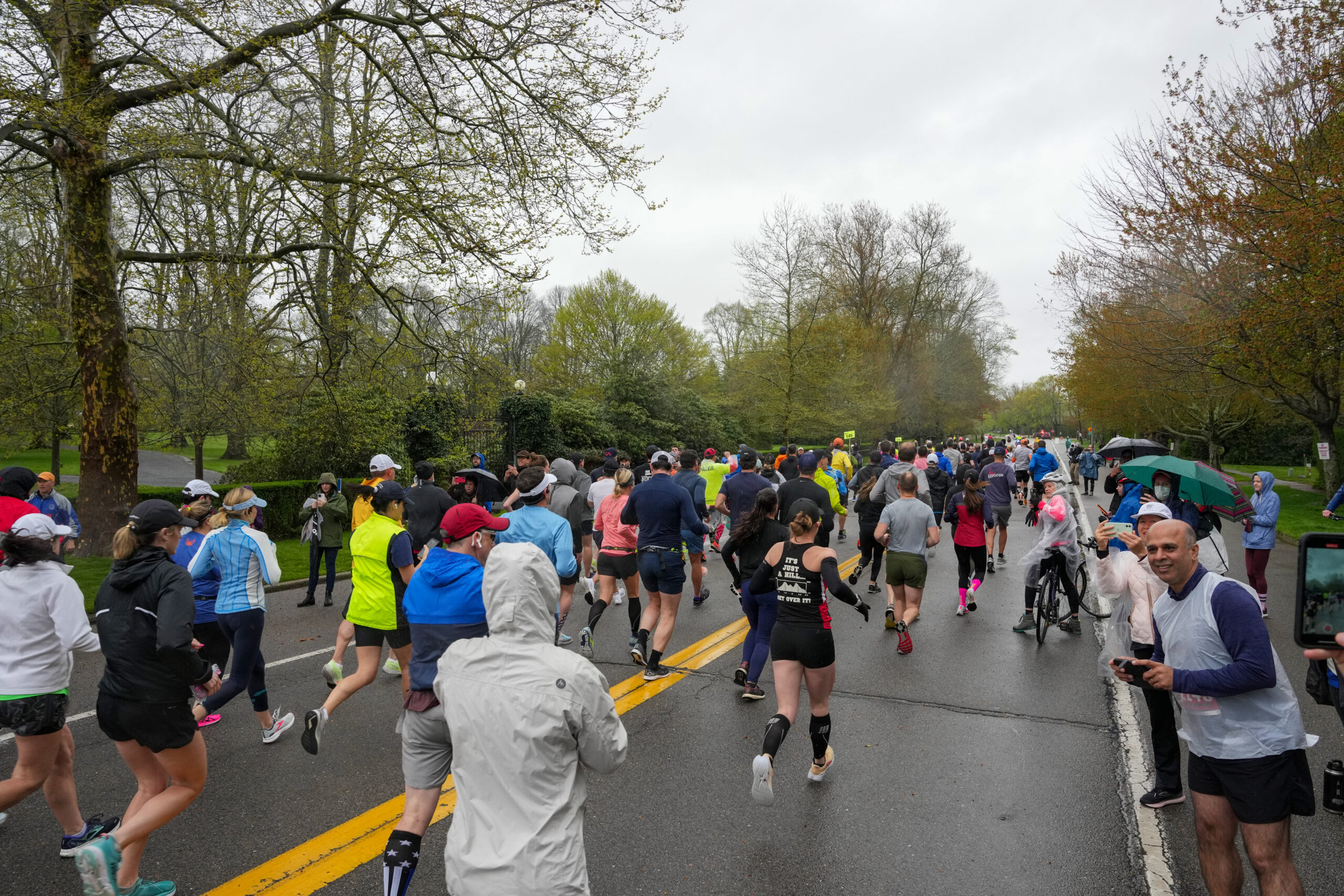 Runners start the seventh annual Bridgehampton Half-Marathon amid rainy and windy conditions on Saturday.  RON ESPOSITO