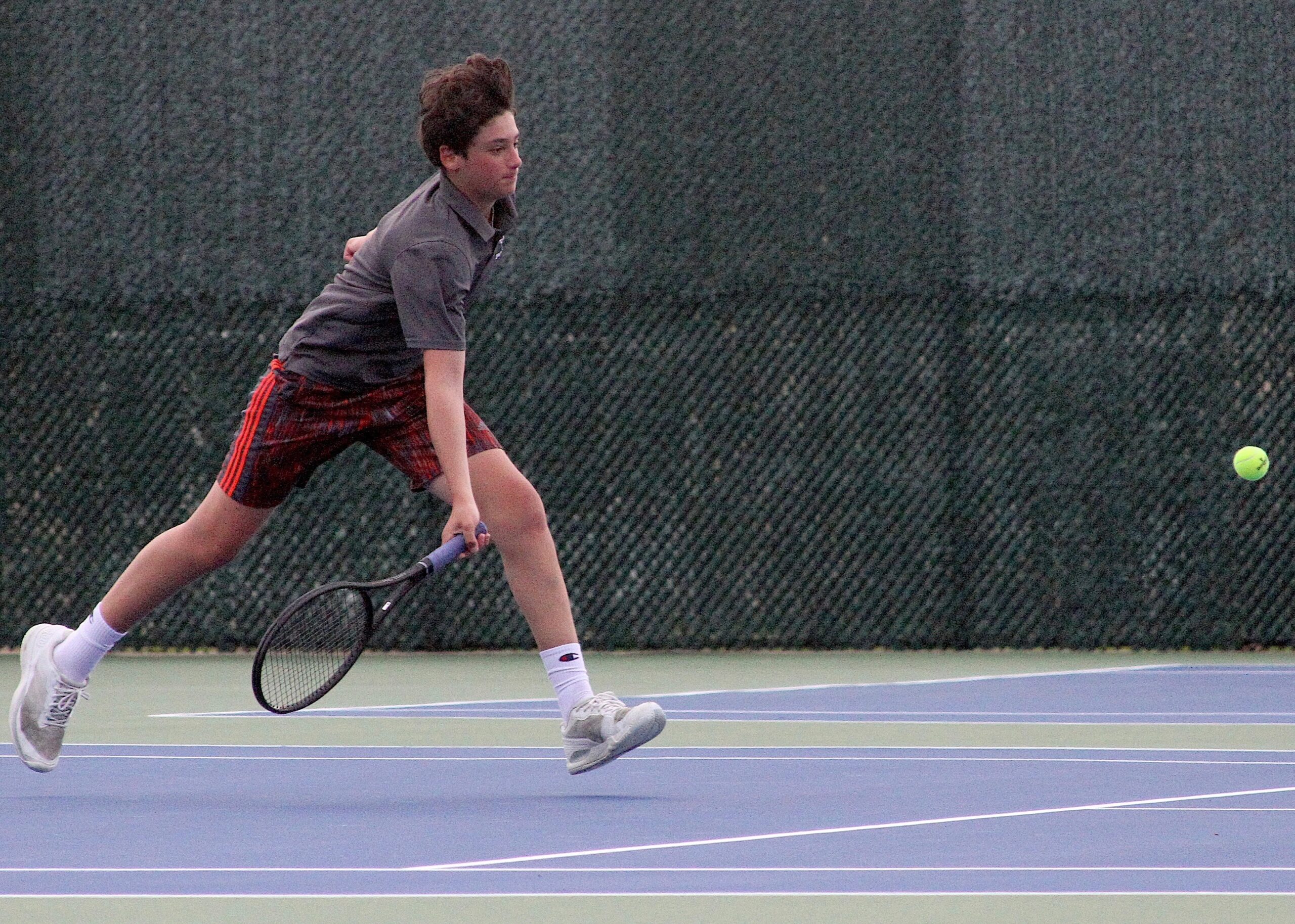Pierson freshman Dane Schwalb races in for a drop shot return. DESIRÉE KEEGAN