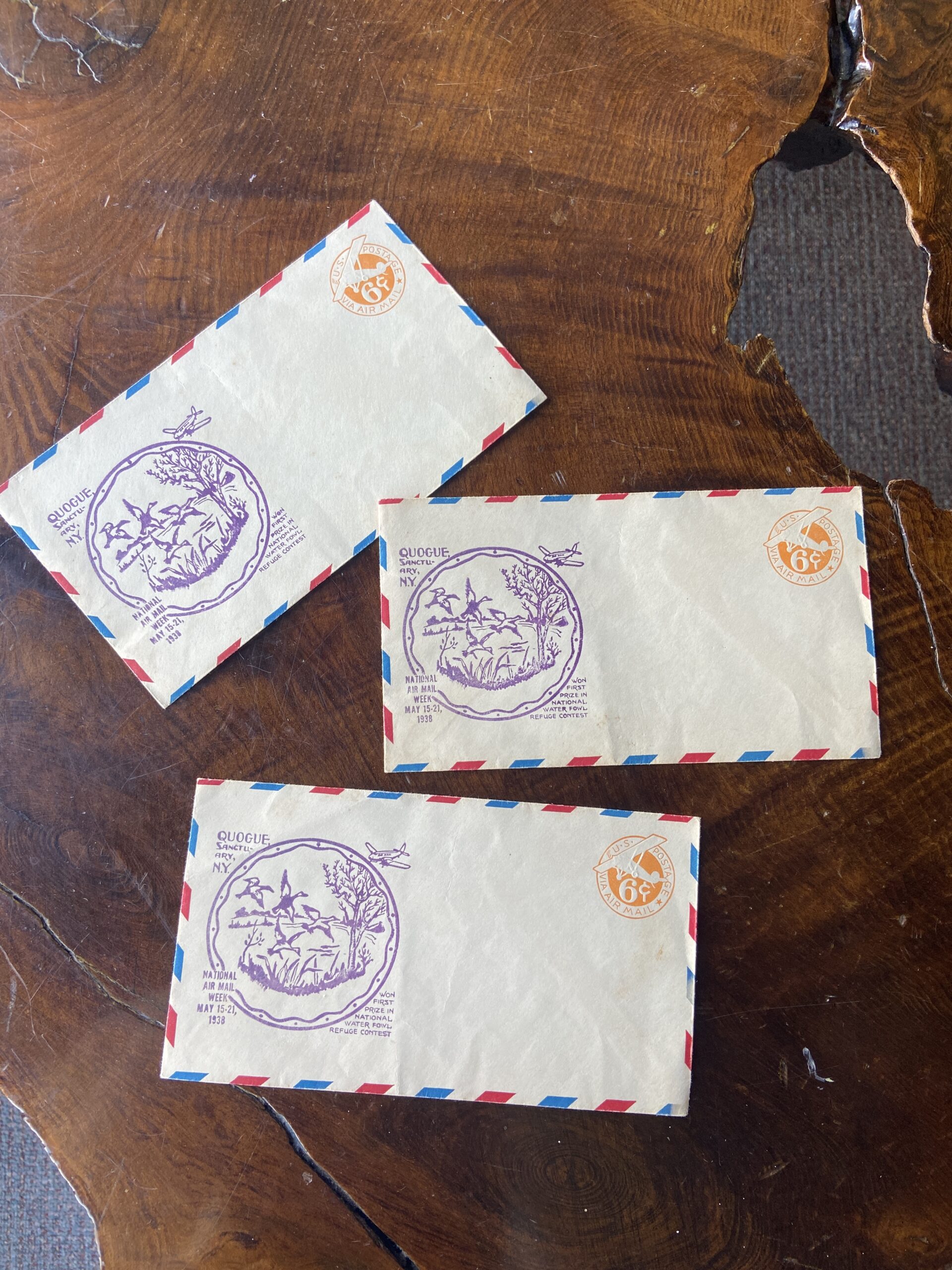 Antique envelopes from National Airmail week in 1938, featuring a stamp of Quogie Wildlife refuge drawn by Roland Clark.