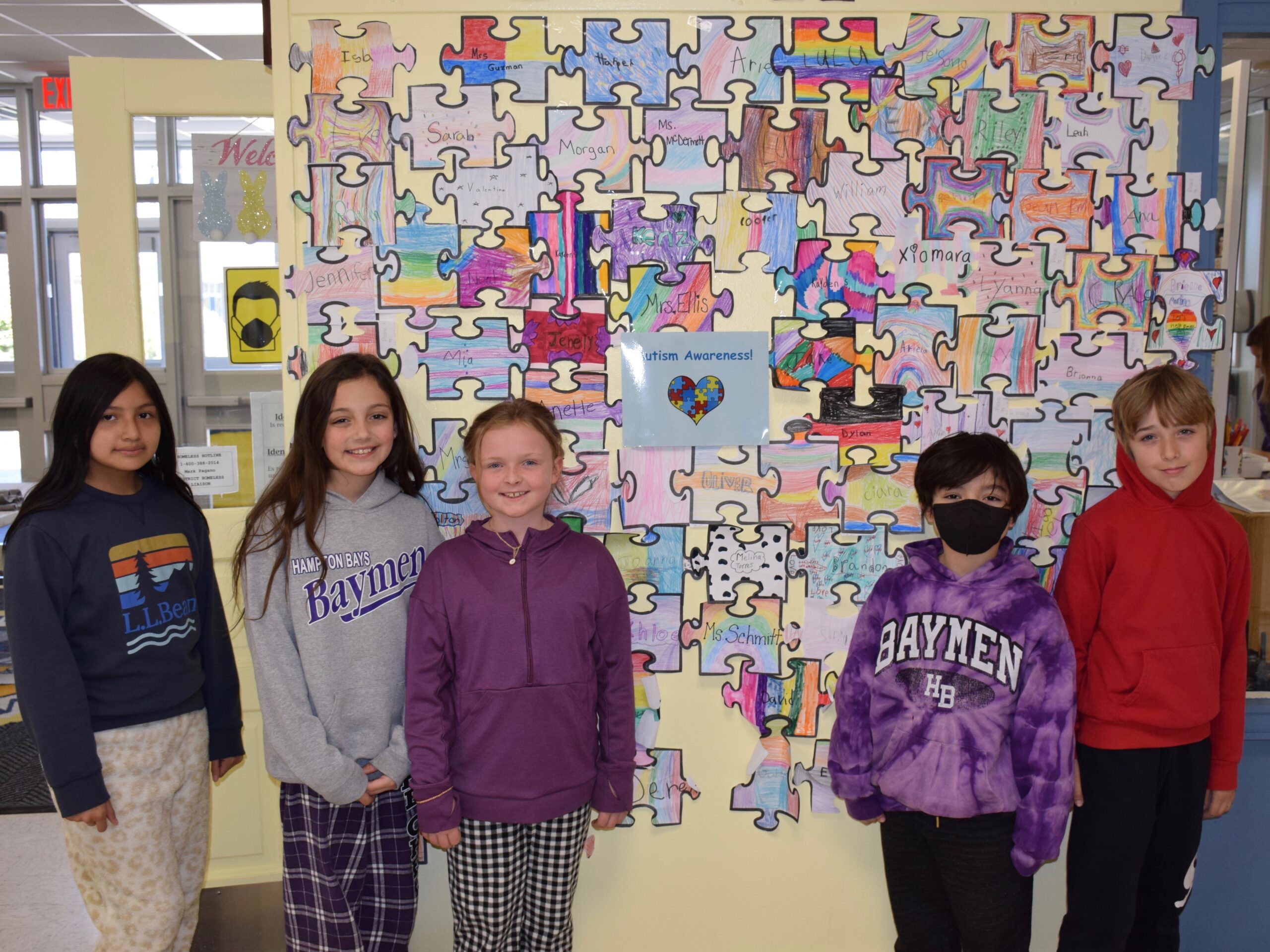 Members of Hampton Bays Elementary School’s service club, K-Kids, raised $200 for the Anderson Center for Autism as part of an annual autism awareness fundraiser. They raised the funds by hosting a pajama day in which students and staff donated money to wear pajamas to school on April 29. The fundraiser is just one of many the K-Kids have hosted this school year. From left, Kelly Guanga, Samantha Betta, Maeve Kelly, Diego Bedoya and Kai Summar. COURTESY HAMPTON BAYS SCHOOL DISTRICT