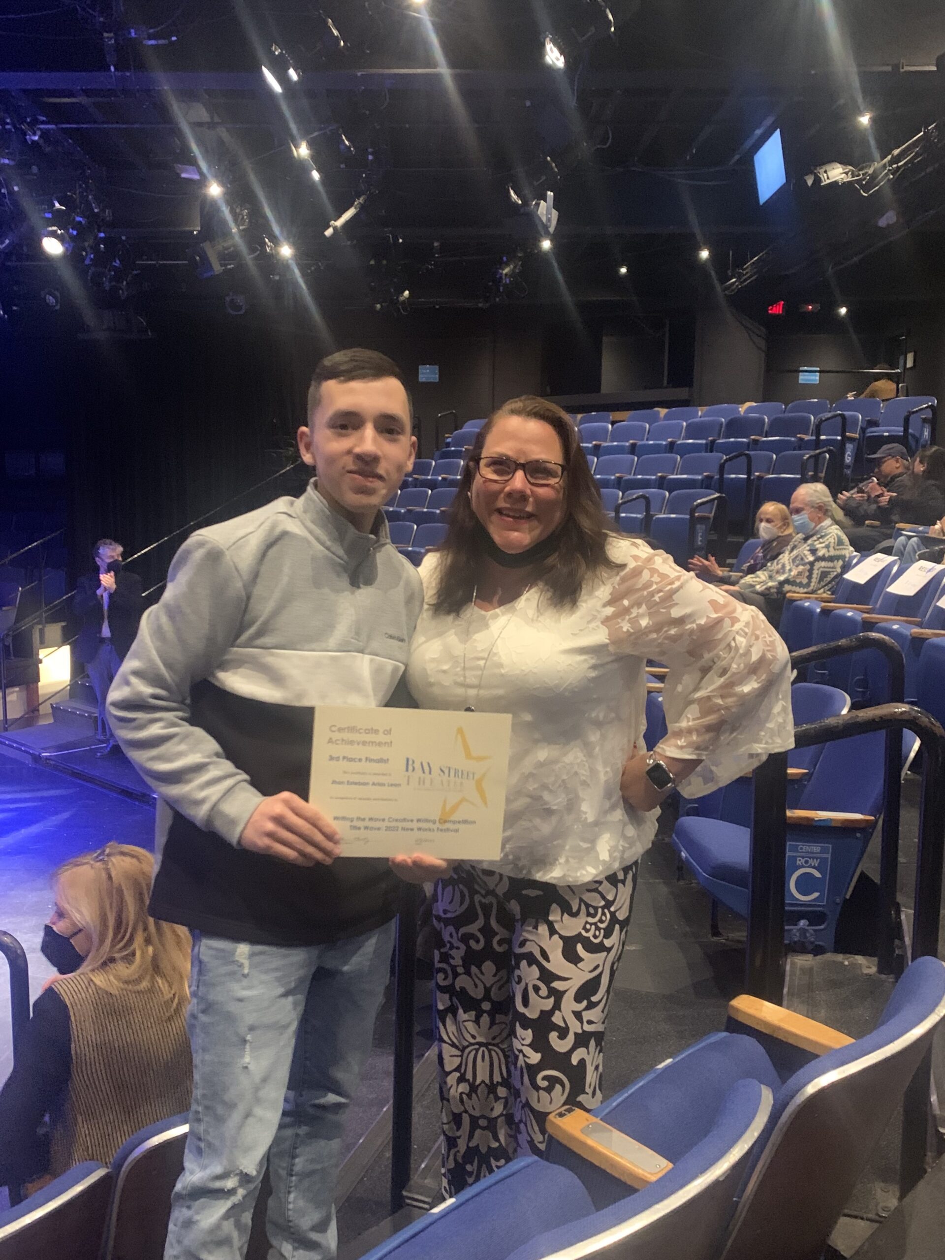 Hampton Bays High School student Jhon Esteban Arias Leon took third place in the Suffolk County “Writing the Wave” creative writing competition, sponsored by Bay Street Theater. With him is his teacher, Kathleen McEarlean. COURTESY HAMPTON BAYS SCHOOL DISTRICT