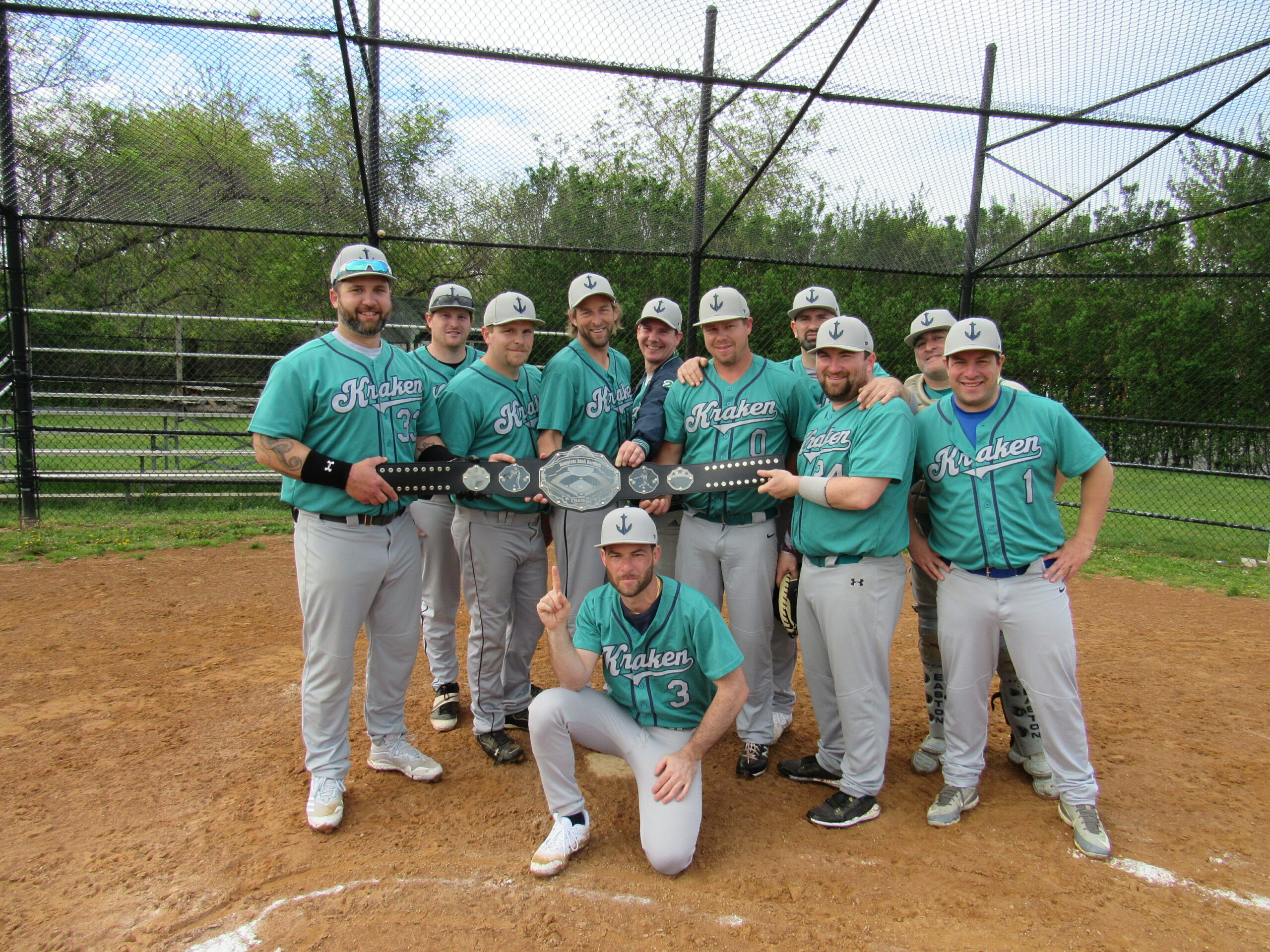 The Harbor Kraken with their 2021 Championship Belt presented to their before their season opener on Sunday.   COURTESY HAMPTONS ADULT HARDBALL