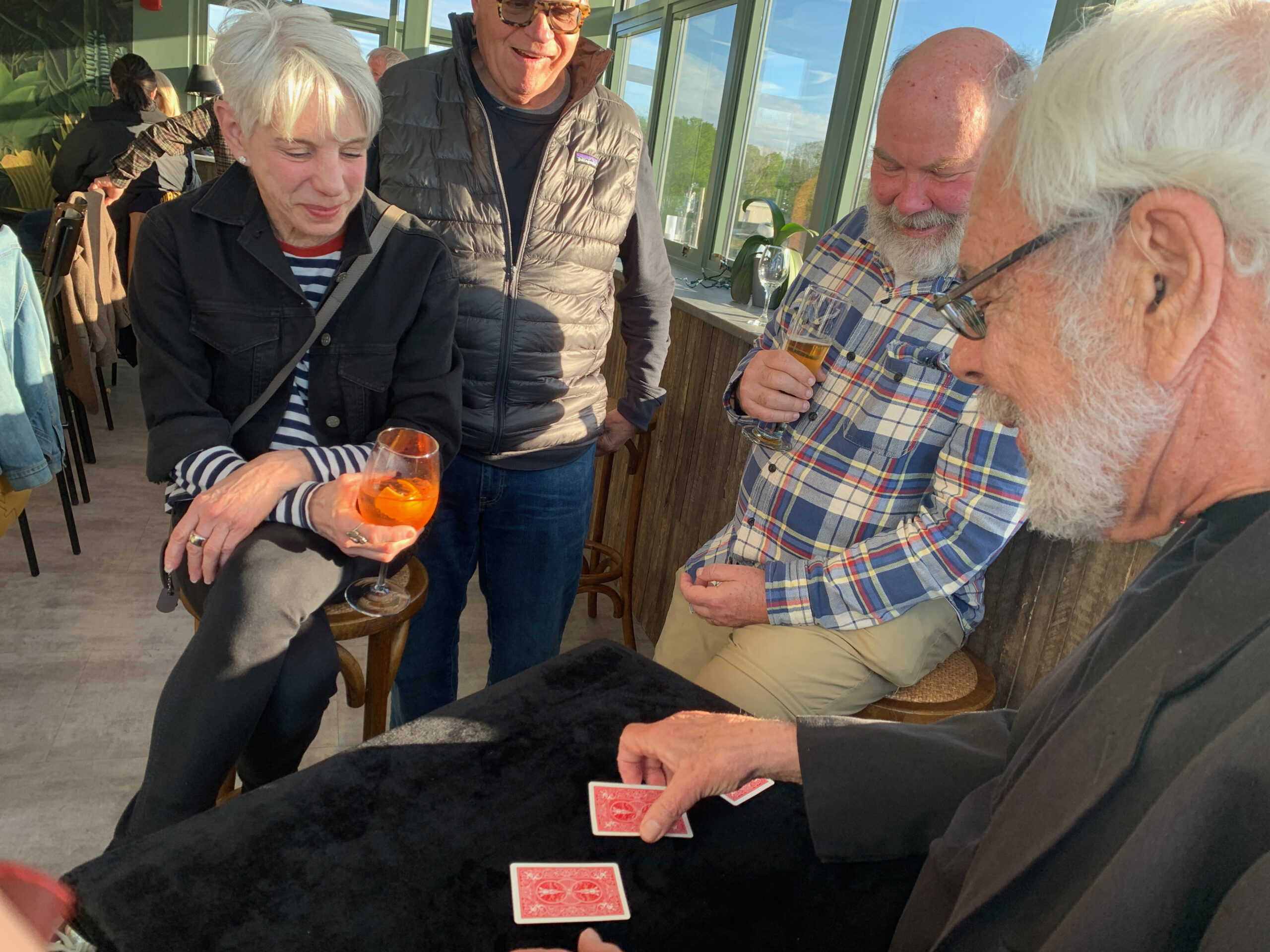 Magician Allan Kronzek stumps the crowd with his card tricks on a recent Tuesday at The Green Room bar of the Sag Harbor Cinema. 