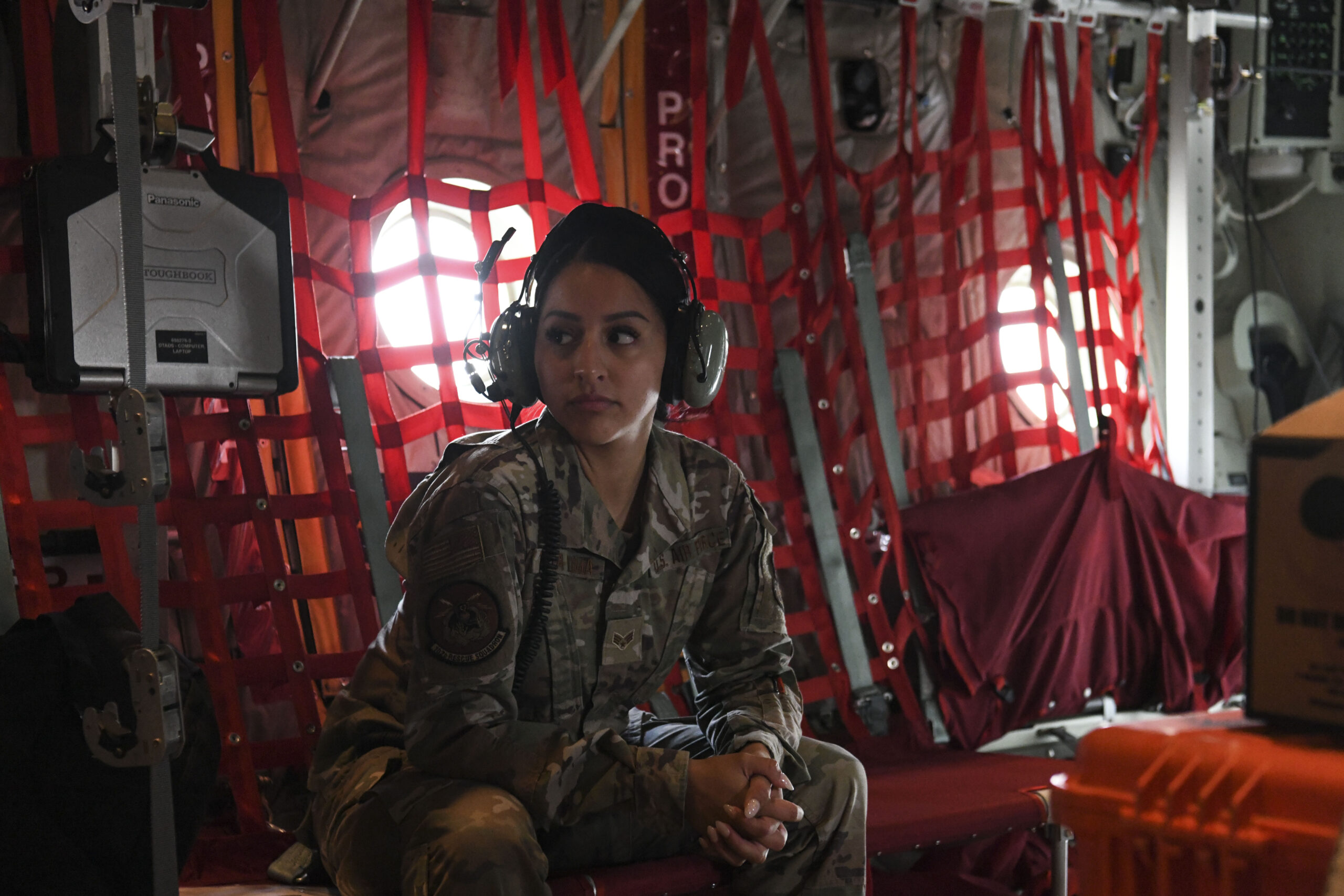 N.Y. Air National Guard 106th Rescue Wing Senior Airman Jocelyn Tapia-Puma, a 102nd Rescue Squadron aviation resource manager, looks toward the back of an HC-130J Combat King II search and rescue aircraft on Friday, May 20. Tapia-Puma was asked to join a search and rescue mission as a Spanish interpreter between members of the 102nd Rescue Squadron and passengers on-board a 32-foot vessel 1,200 miles off the coast of Long Island, who had a passenger severely burned.  U.S. AIR NATIONAL GUARD PHOTO BY SSGT. DANIEL H. FARRELL