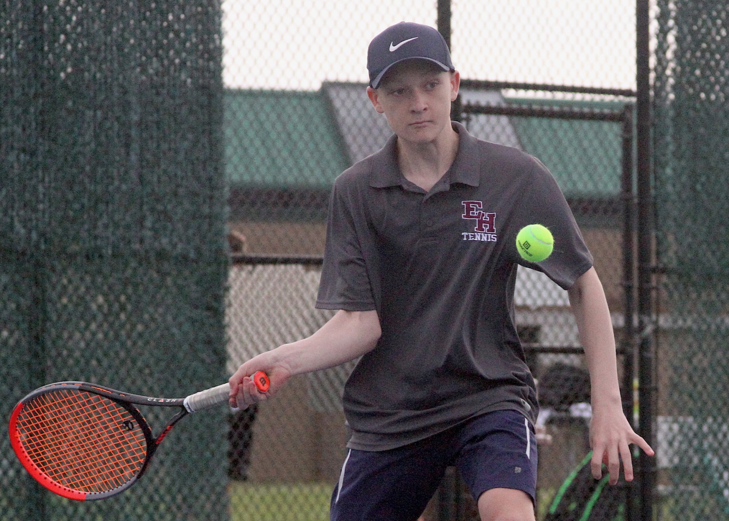East Hampton freshman Kiefer Mitchell returns a serve. DESIRÉE KEEGAN