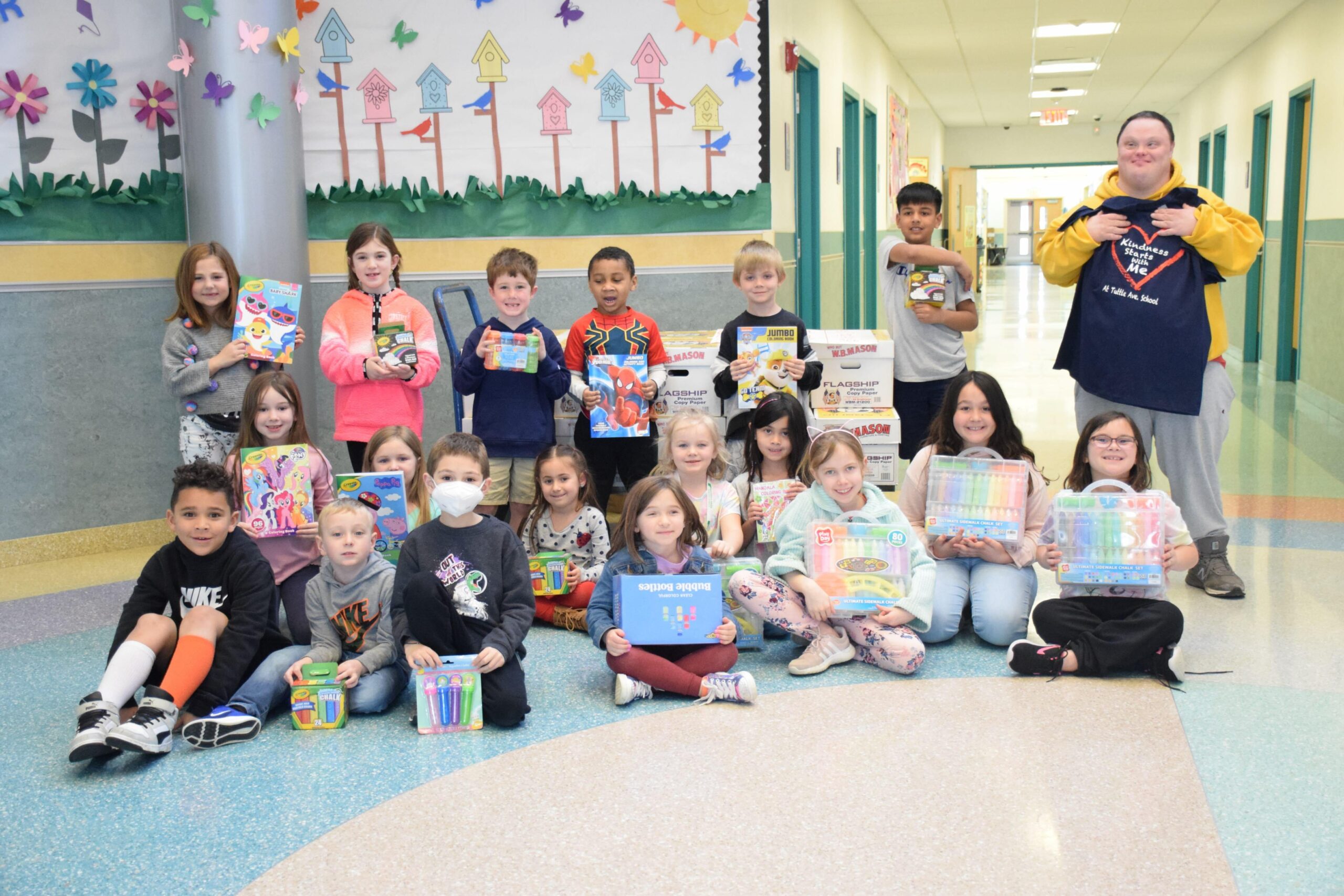 Tuttle Avenue Elementary School students in the Tuttle Cares Club led by teacher Nicole Rau recently completed a fundraising effort to benefit the Helping Makes U Happy organization. COURTESY EASTPORT-SOUTH MANOR SCHOOL DISTRICT