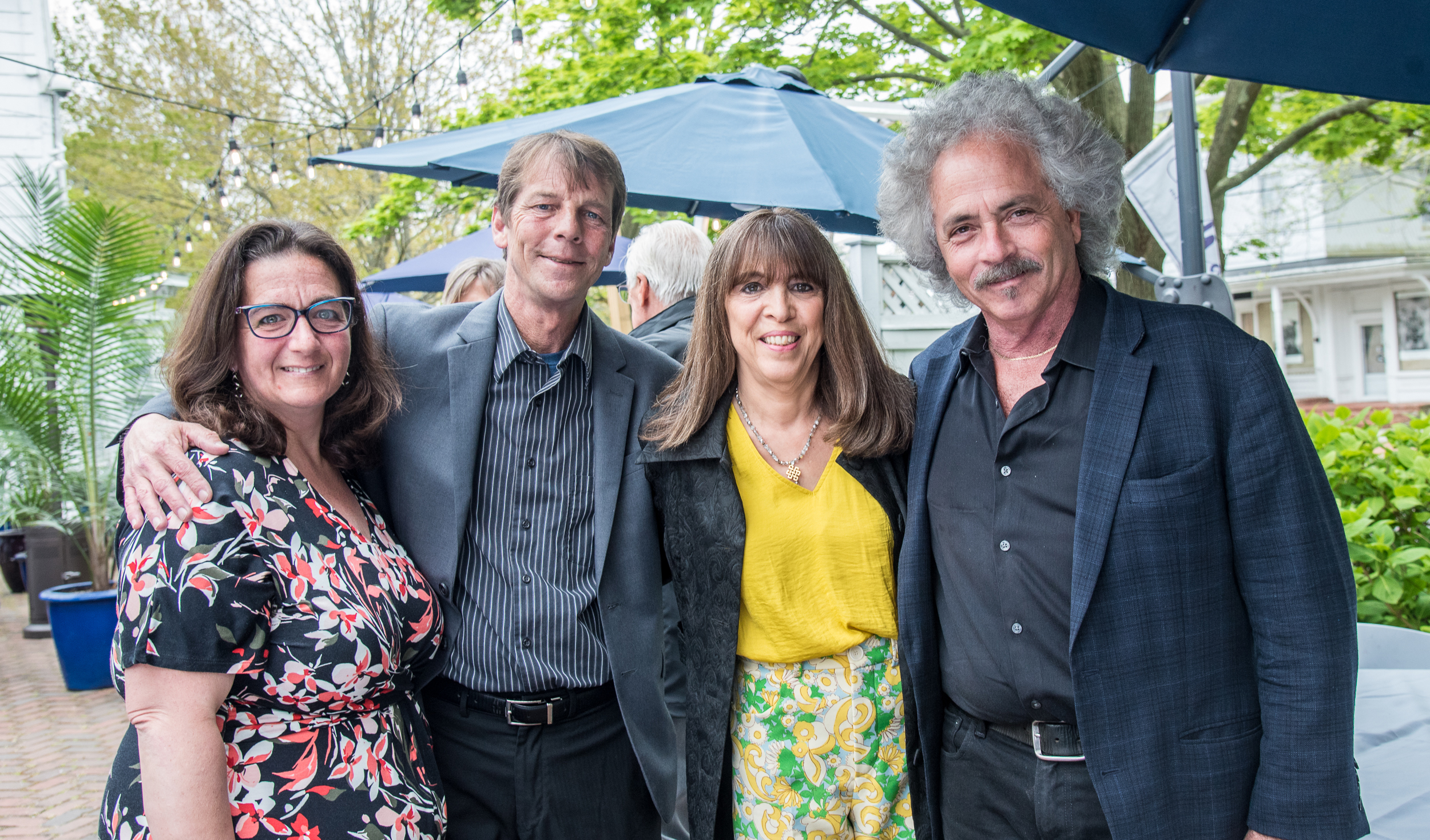 Stacy Stanzione, Dan O'Shea with Sara and Russel Blue at the Maureen's Haven Homeless Outreach Volunteer Thank You dinner on Friday evening at Blu Mar Hamptons in Southampton Village.   LISA TAMBURINI
