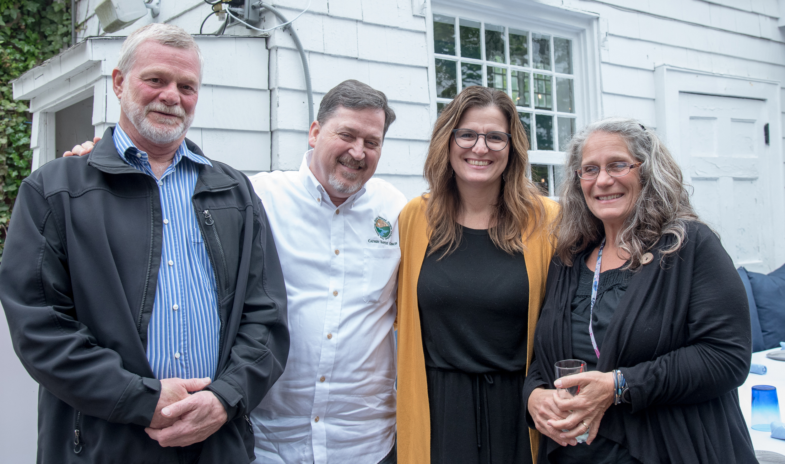 Rick Tamraz, Pastor David Cooke, Christina Cooke and Laurie Whittemore at the Maureen's Haven Homeless Outreach Volunteer Thank You dinner on Friday evening at Blu Mar Hamptons in Southampton Village.   LISA TAMBURINI