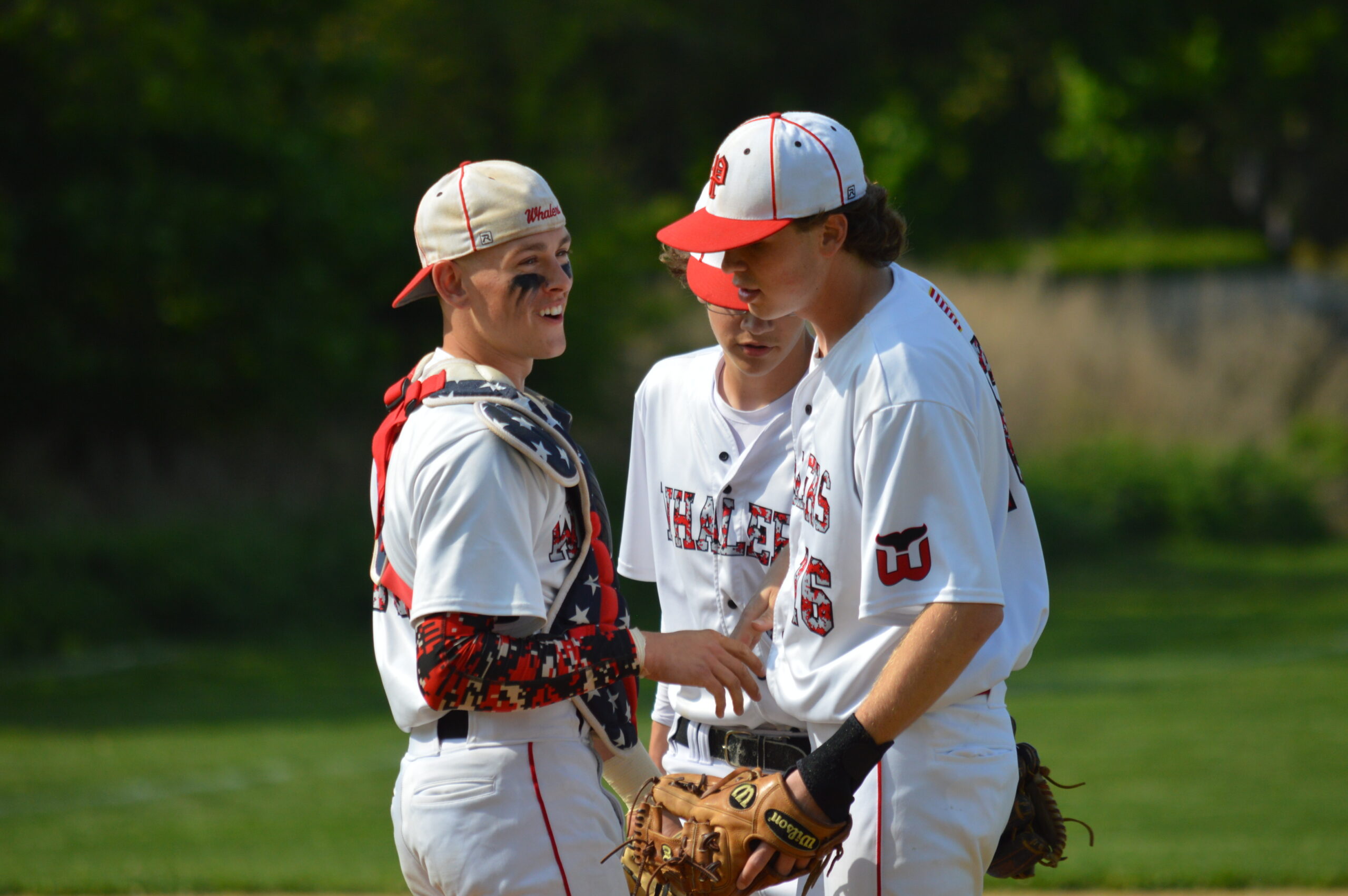 Gavin Gilbride, left, talking to Dan Labrozzi during Friday’s playoff win over Southold.    GAVIN MENU