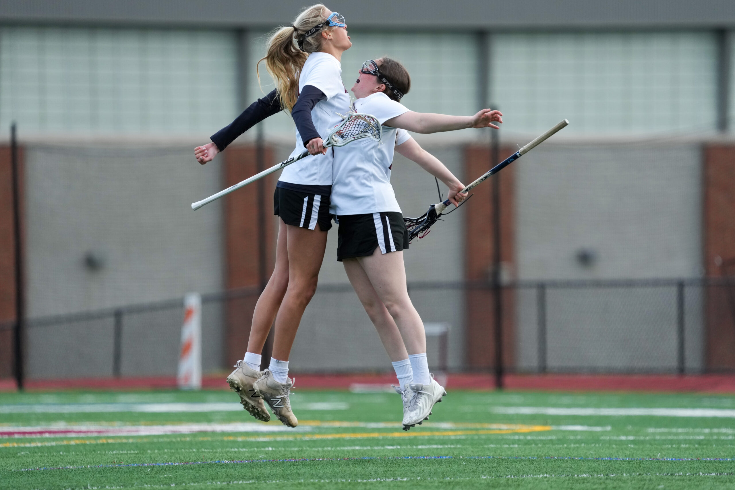 Mariners Autumn Wilson, left, and Paige Garvin celebrate a goal.   RON ESPOSITO