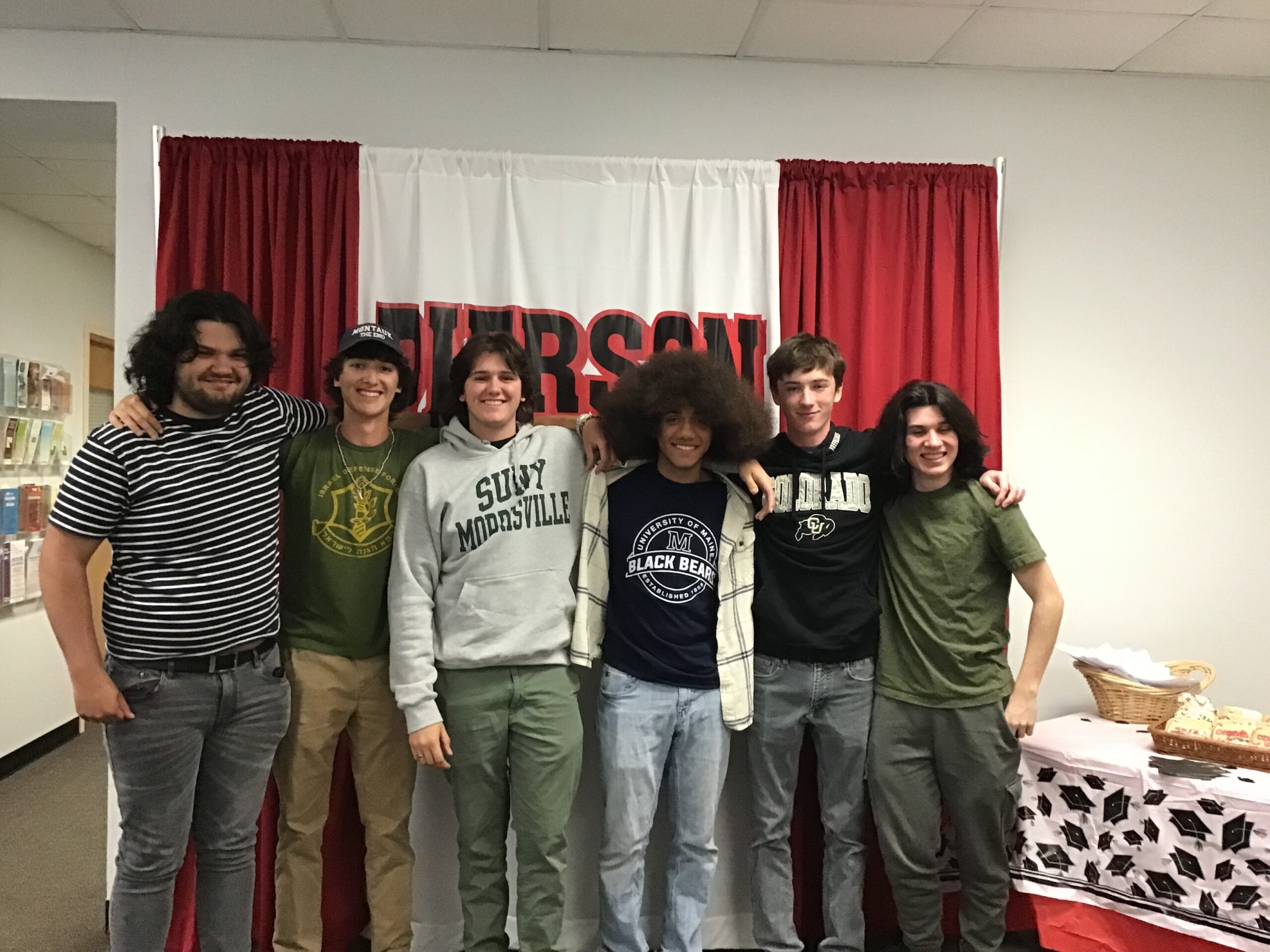Pierson High School seniors Lukas Montiero, Daniel Bitton, John Nill, Jaylen Cooks, Owen Caufield and Zachary Vaccaro celebrated Pierson’s Decision Day. According to Pierson guidance counselor Margaret Motto, “Decisions Day is celebrating each student's formal decision to graduate and choose a new path. We are honoring not just chosen colleges but also those entering the workforce, military service or other training paths as well.” COURTESY SAG HARBOR SCHOOL DISTRICT