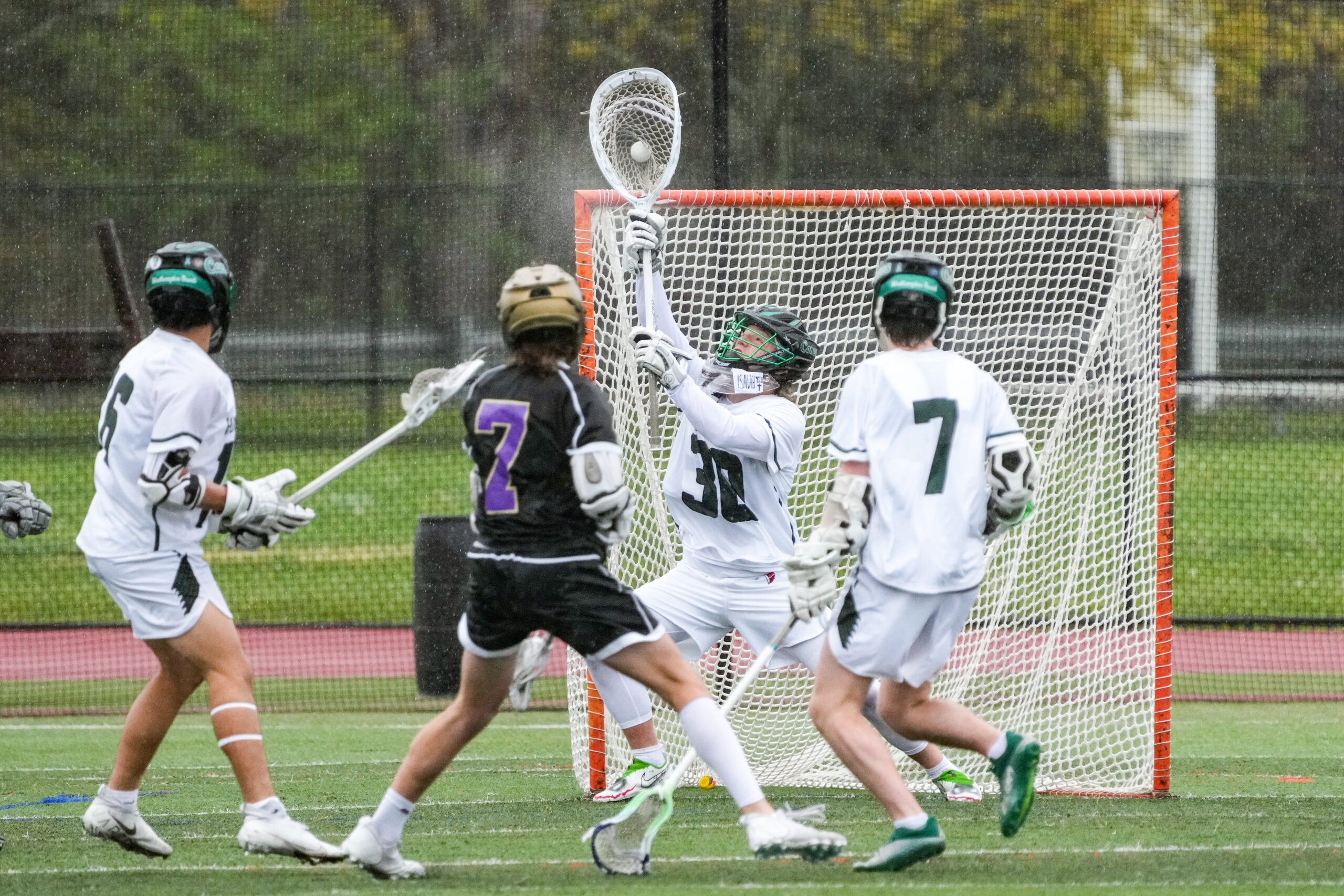 Westhampton Beach senior Jake Dagata makes one of his 11 saves in Friday's 8-6 victory over Islip.   RON ESPOSITO