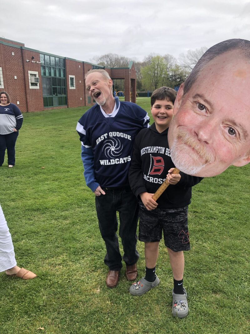 East Quogue School students surprised Superintendent and Principal Rob Long with a special performance of the Natalie Merchant song 