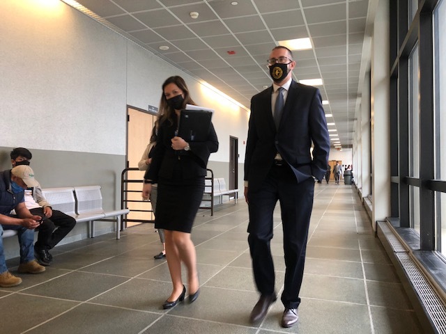 Lead prosecutor in the upcoming trial of Joseph Grippo leaves the courtroom with fellow assistant district attorney Emma Henry, who will join him at the prosecution’s table July 18. T. E. McMORROW