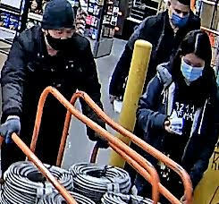Store security camera captured images of suspects in a gift card scam at Home Depot in Riverhead.