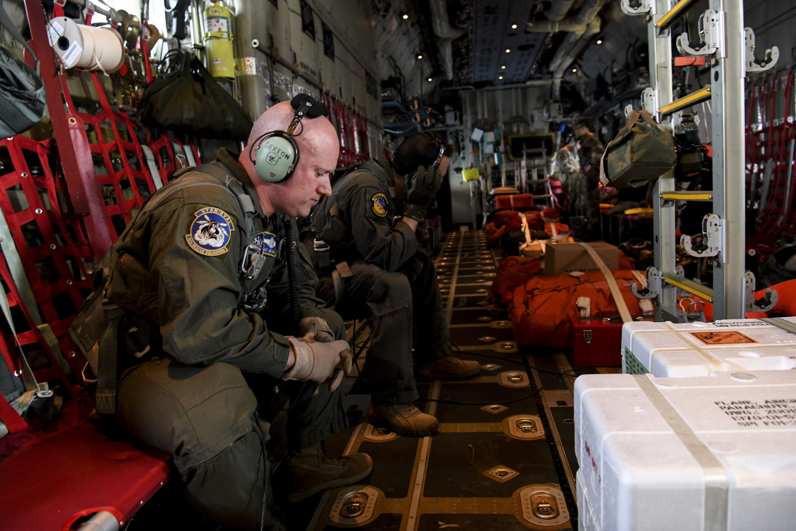 N.Y. Air National Guard 106th Rescue Wing Master Sgt. Joseph Sexton, a 102nd Rescue Squadron loadmaster, sits on-board an HC-130J Combat King II search and rescue aircraft, participating in a search of a 32-foot vessel 1,200 miles off the coast of Long Island on Friday, May 20.  U.S. AIR NATIONAL GUARD PHOTO BY SSGT. DANIEL H. FARRELL