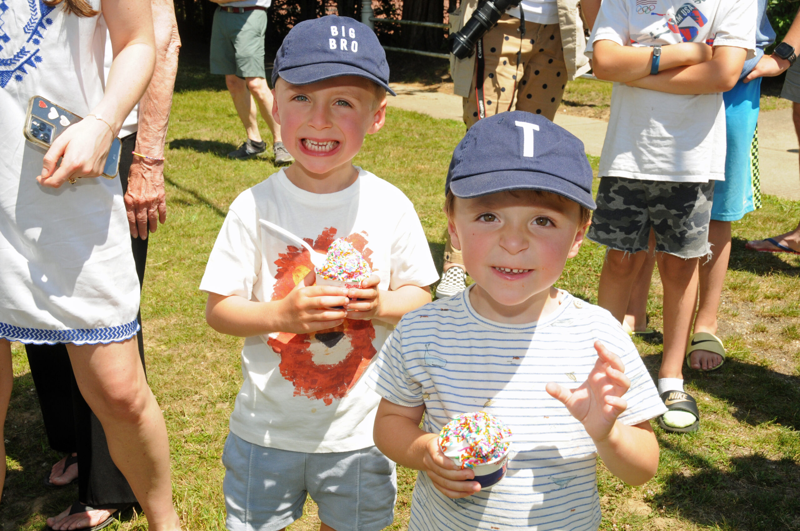 Jake and Tatum Davison enjoy a cool treat at the he Amagansett Village Improvement Society's Ice Cream Social. Besides a free cup of Mister Softee's finest, guests enjoyed music by The Popsicles, A.V.I.S. T-shirts, and family fun.   RICHARD LEWIN