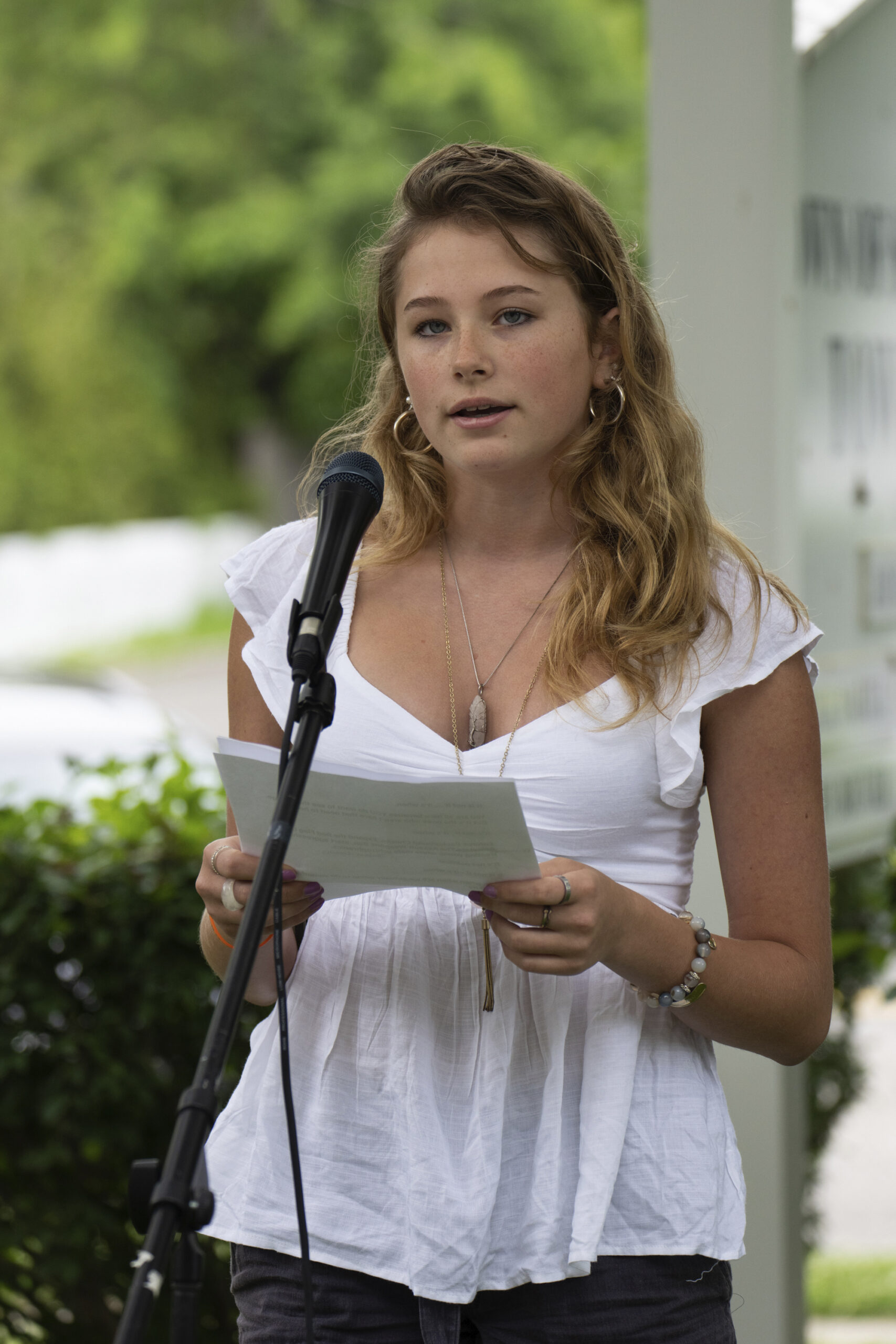 Scout Whiting, 16, speaks at the  anti-gun rally outside at the Southampton Town Hall on Saturday.   LORI HAWKINS