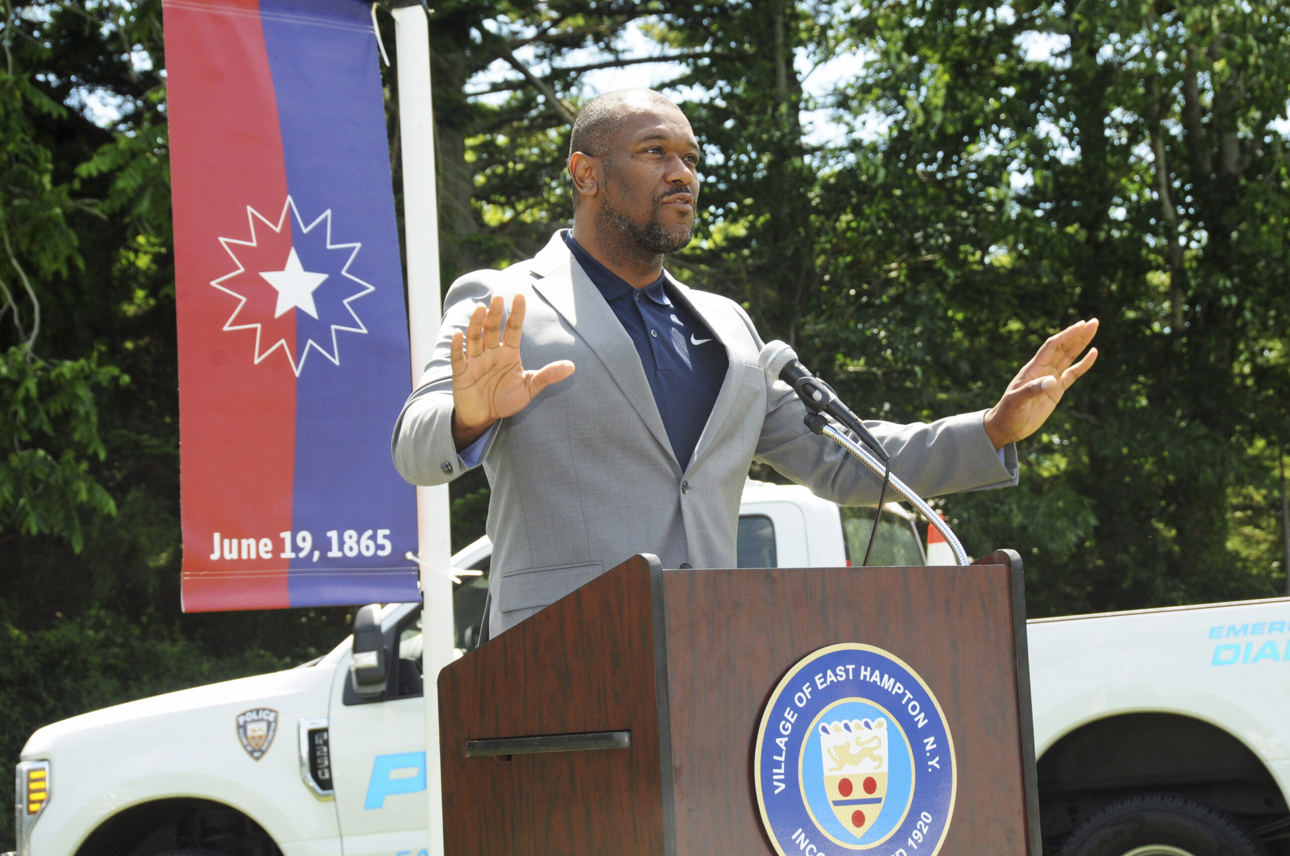 The Reverend Dr. Lewis Brogdon, associate professor and director of the Institute for Black Church Studies at the Baptist Seminary in Louisville, KY, gives the keynote speech at East Hampton Village's Juneteenth celebration in Herrick Park on Sunday.   RICHARD LEWIN