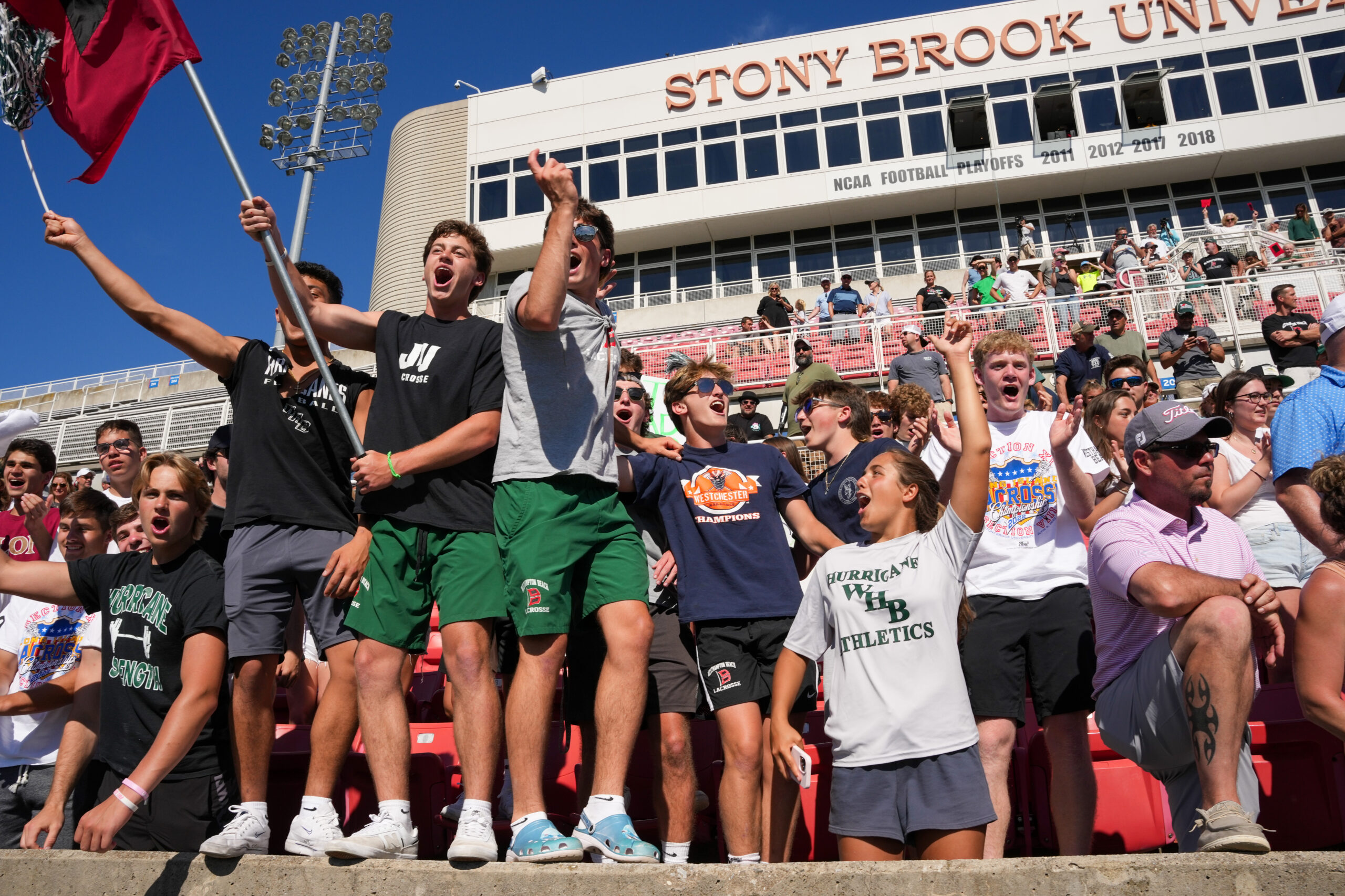 A large contingent of fans made the trip to Stony Brook University to cheer on the Westhampton Beach girls lacrosse team in the Long Island Championship. In the days before Title IX, girls team almost never had spectators for their games. RON ESPOSITO