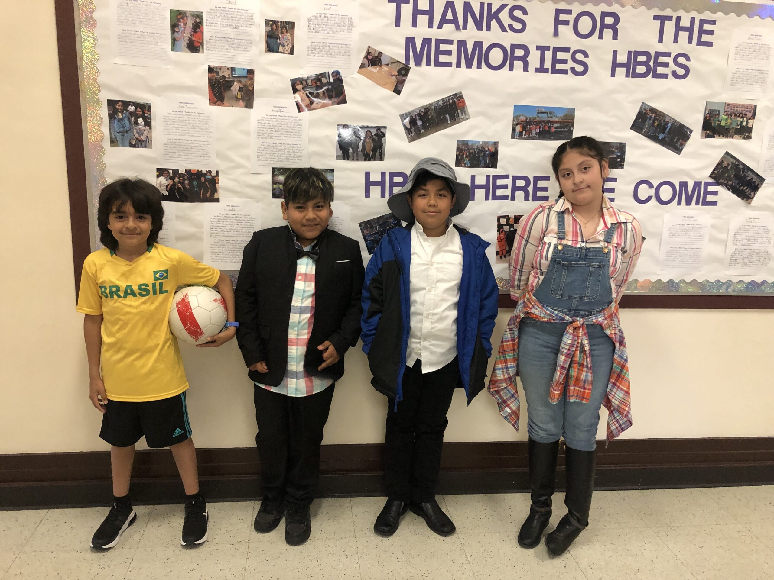Hampton Bays Elementary School fourth grade students in Amy
McNamara’s class, including from left, Jayden Mejia, Israel Portrero, Leo Ferrufino and Emily Villalba, recently wrote biographies of famous people. The students researched a chosen individual, wrote a report, and then dressed up as that individual and presented in front of the class. Their subjects included famous soccer players, Harry Houdini, Paul Revere, Dolly Parton and Helen Keller. COURTESY HAMPTON BAYS SCHOOL DISTRICT