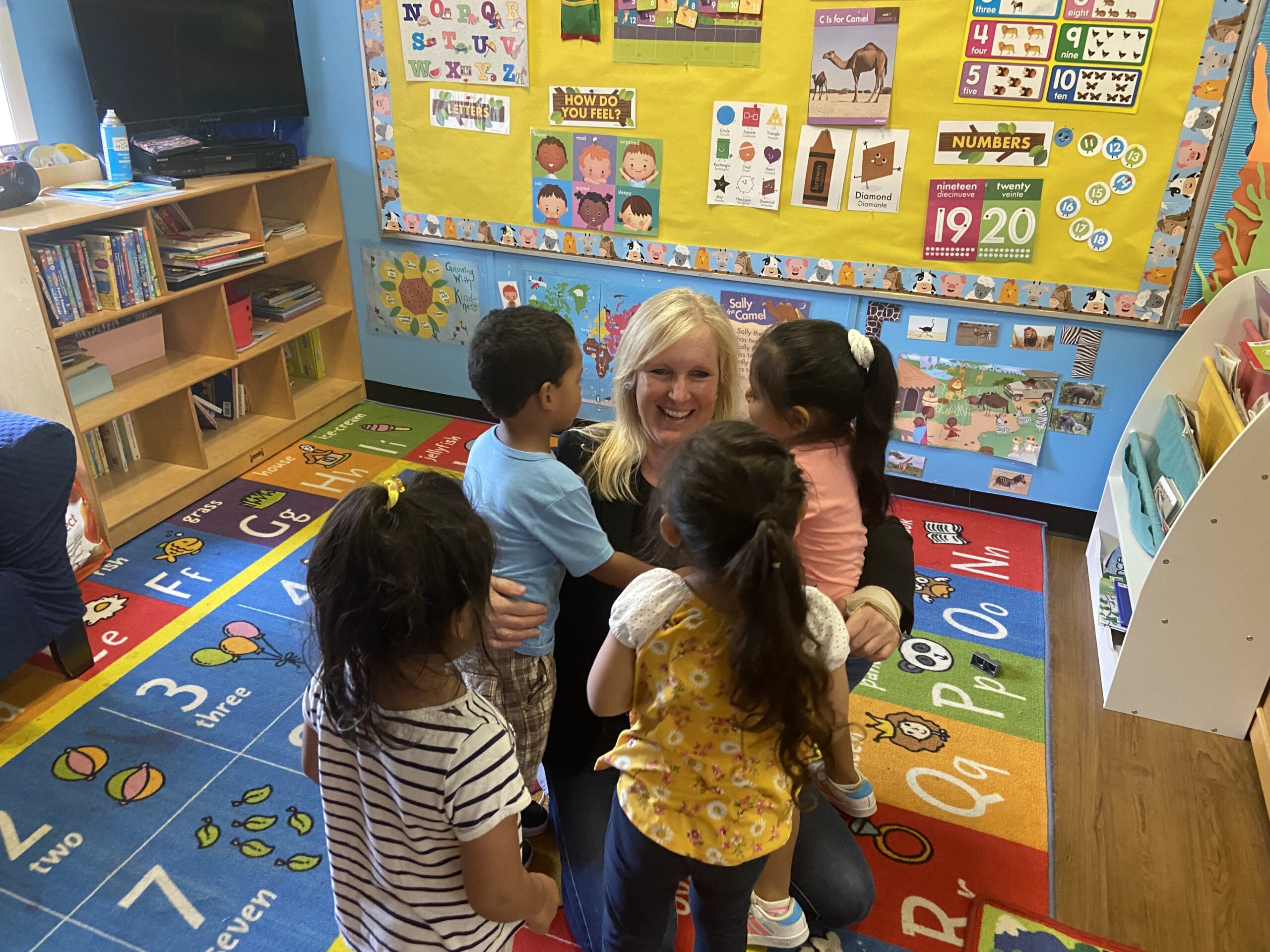 BY JULIA HEMING Southampton Day Care Center president Susan Hovdesven with the preschool class.