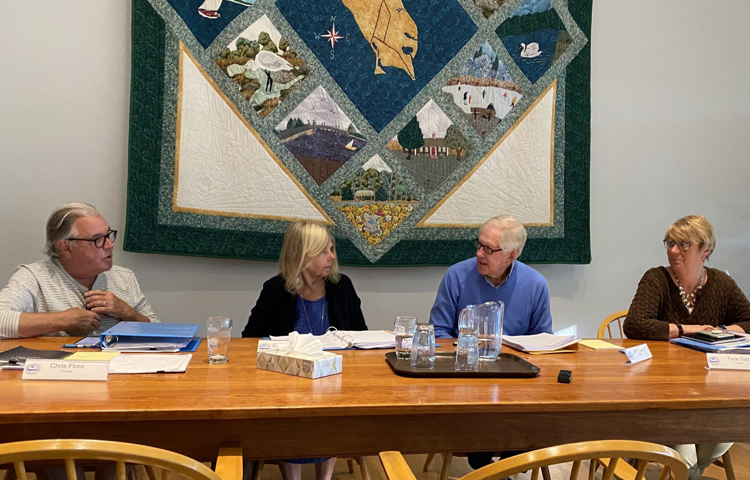 From left, Mayor-elect Chris Fiore, Trustee Diane Skilbred, Mayor Jeff Sander and Trustee Terie Diat (Trustee Claas Abraham is out of frame at right) at Sander’s final monthly meeting as mayor after four two-year terms. He chose not to seek reelection. PETER BOODY