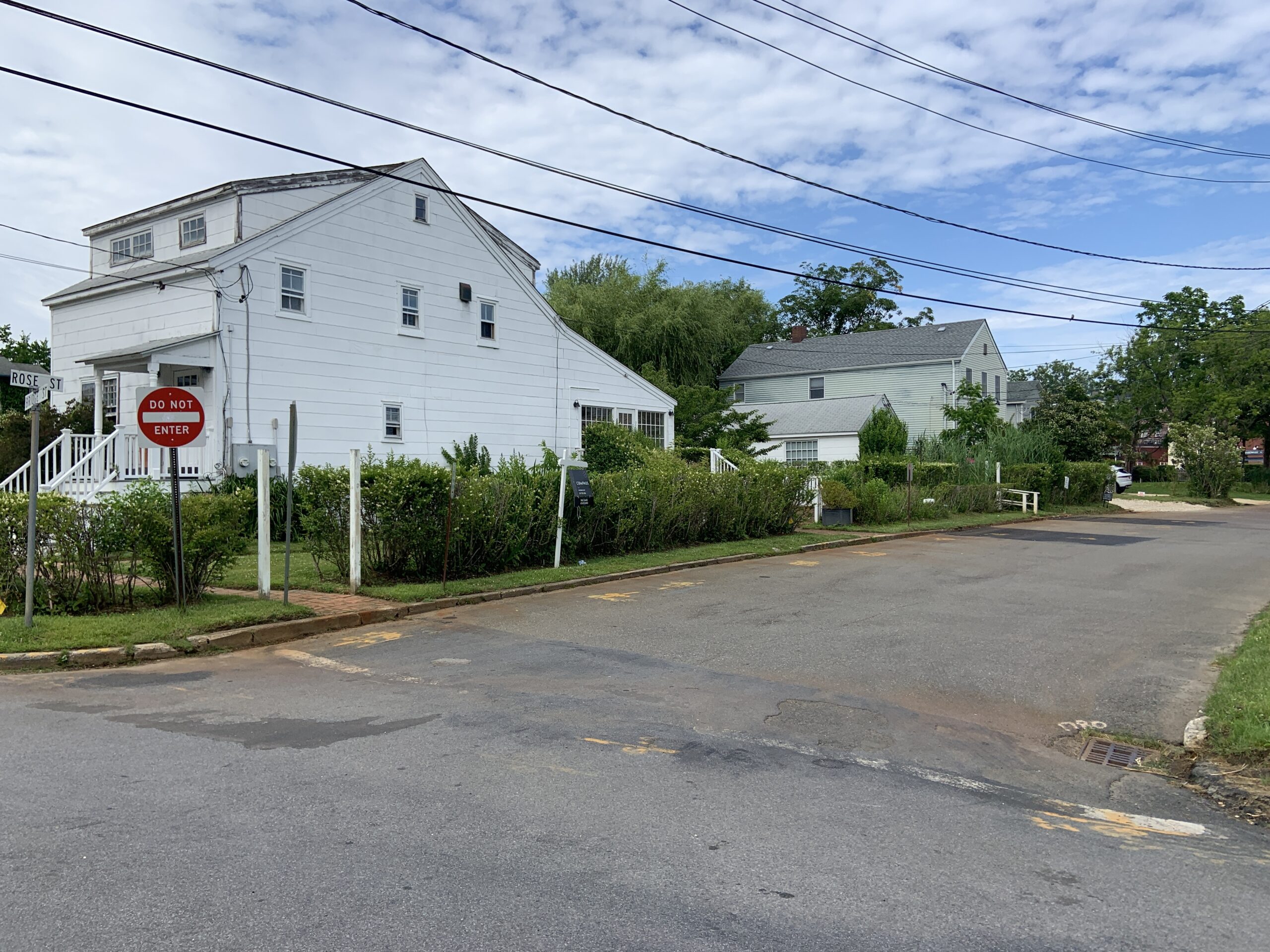 These houses on Rose Street would be replaced with a single three-story building as apart of a major redevelopment proposal between Rose and Bridge streets in Sag Harbor. STEPHEN J. KOTZ