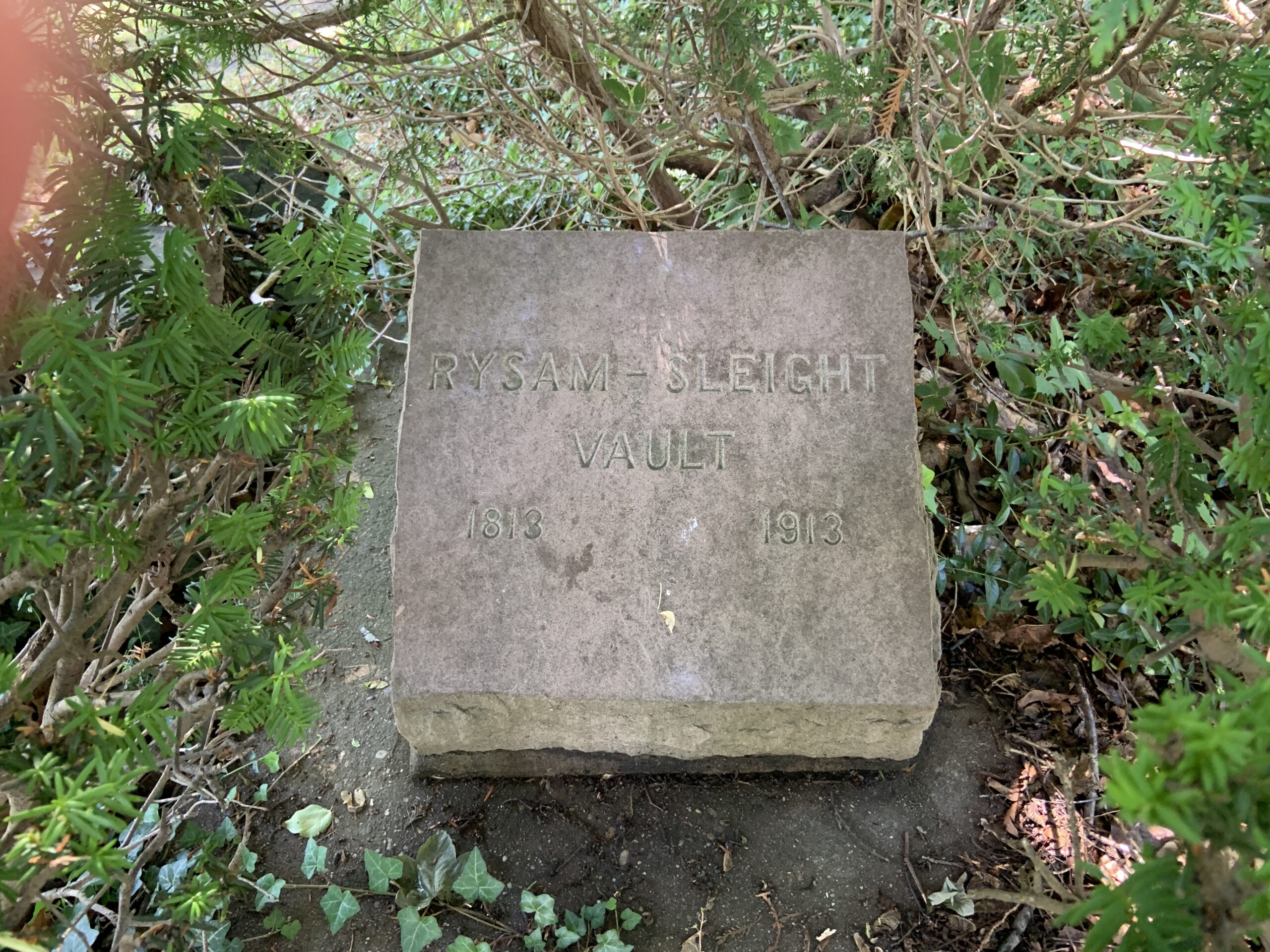A brownstone marker for the Rysam Sleight vault can be found on High Street at the end of Rysam Street in Sag Harbor. STEPHEN J. KOTZ