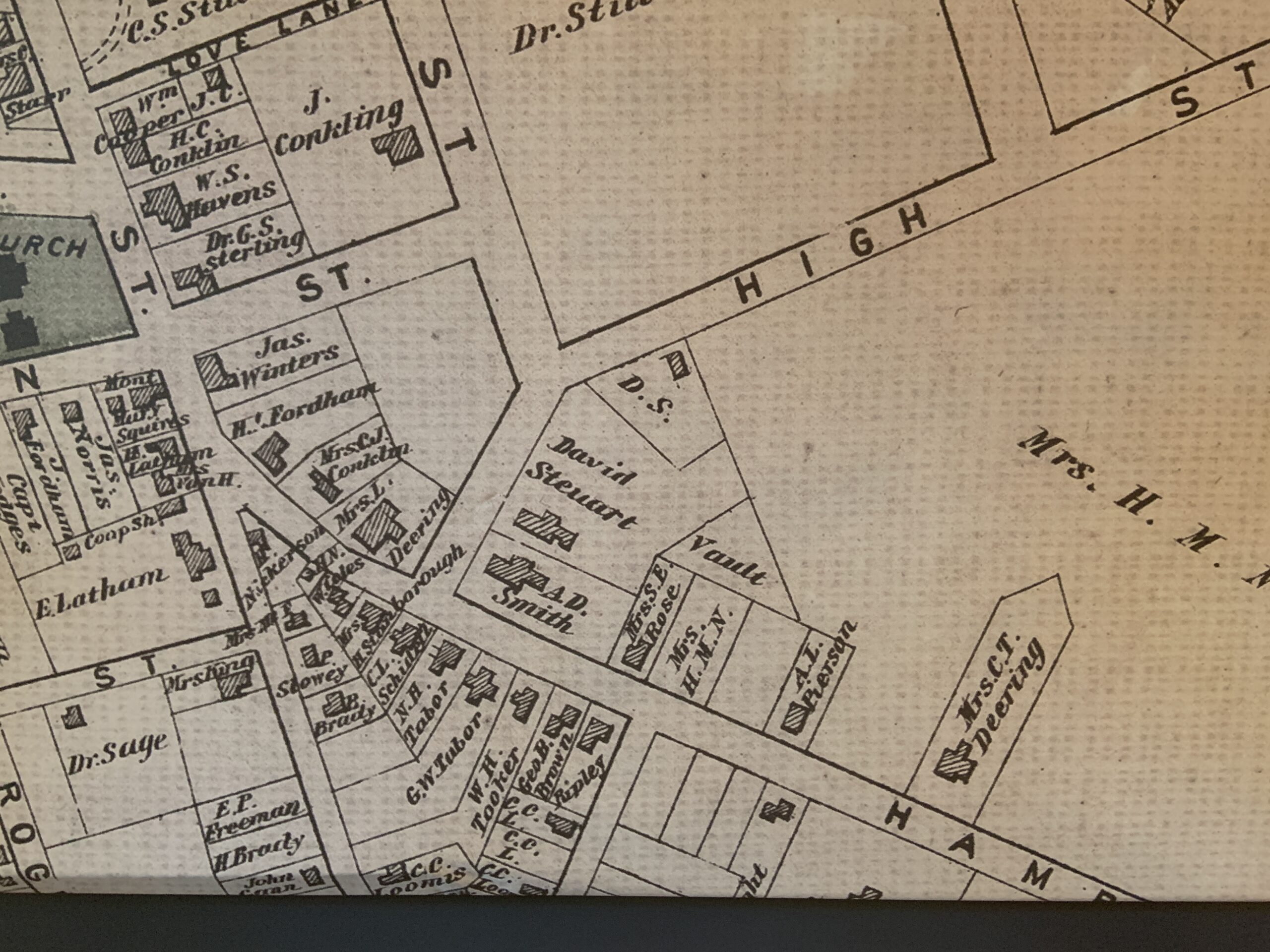An 1873 tax map shows a triangular lot marked Vault.