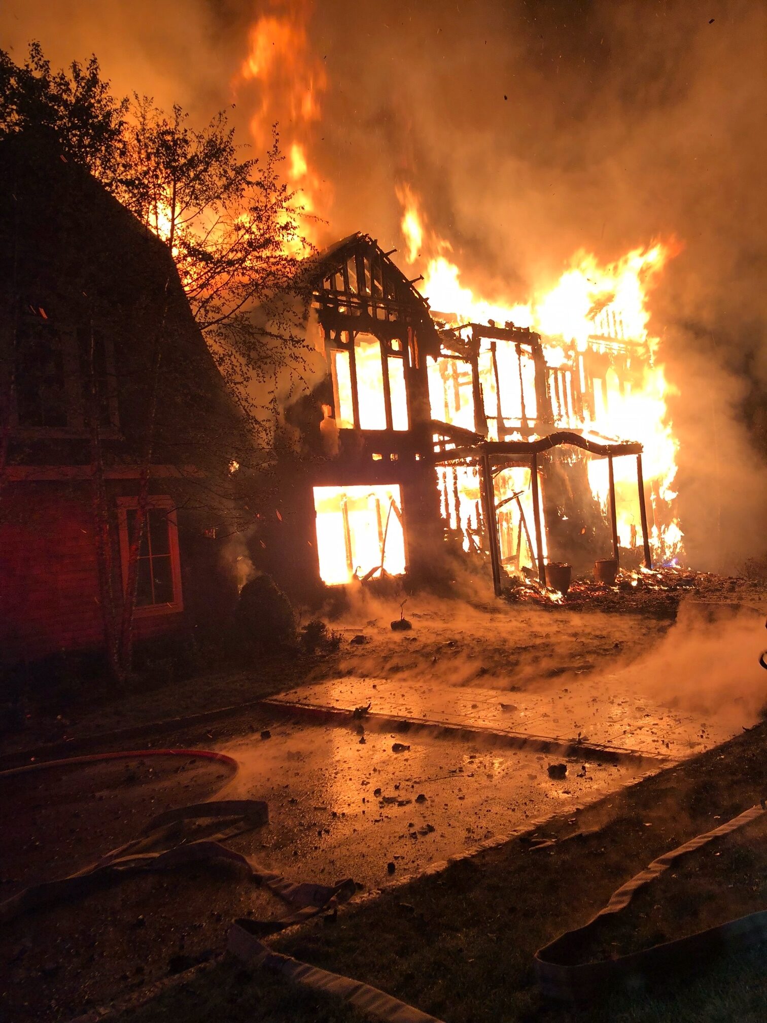 A massive fire in Bridgehampton destroyed one home and damaged others.