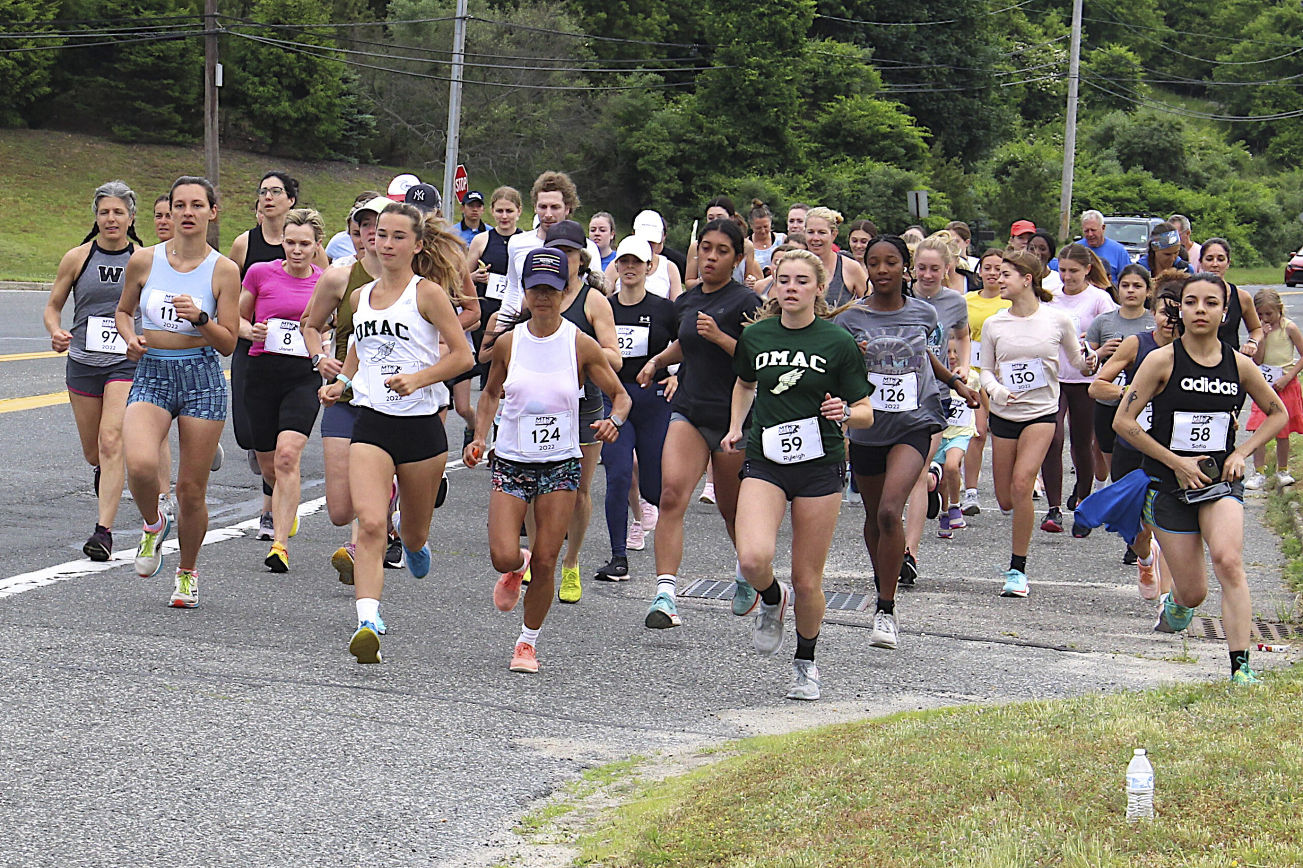 Runners compete in the Montauk Mile on Sunday.  KYRIL BROMLEY