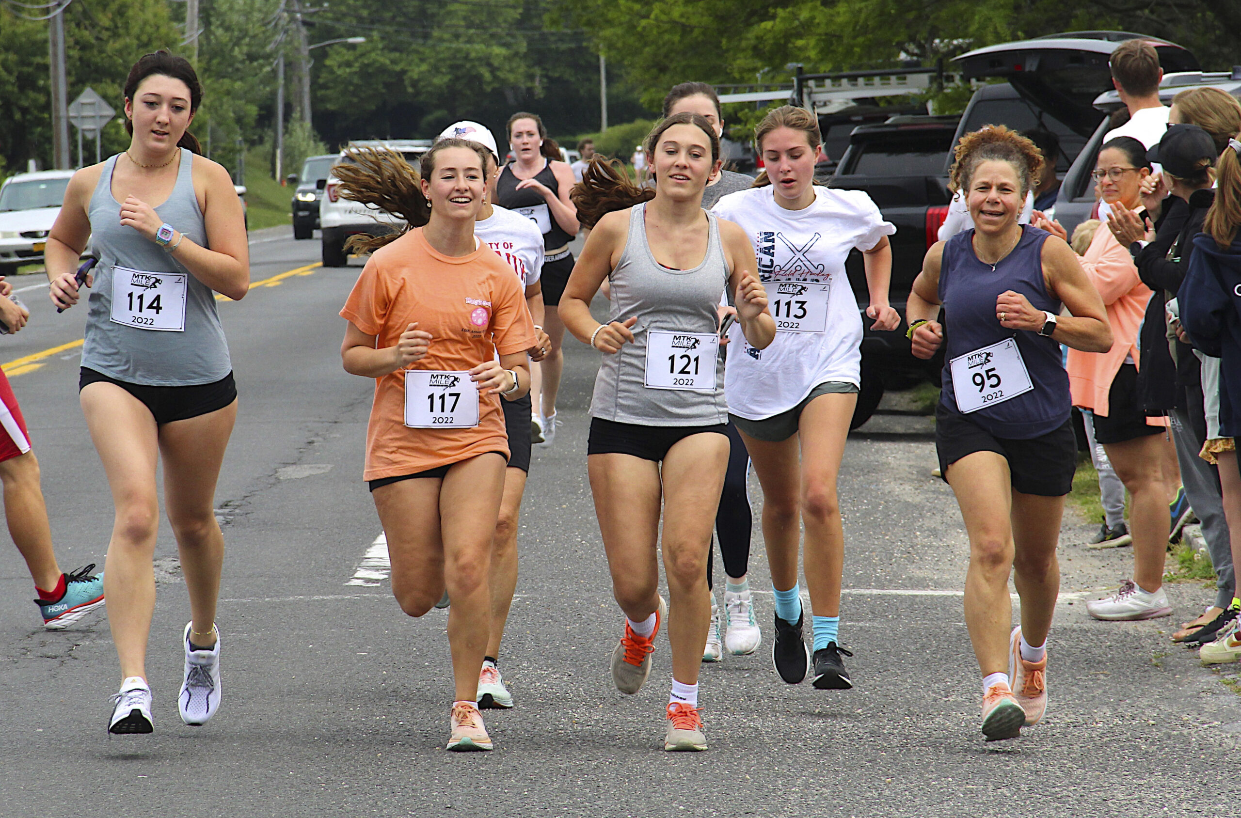 Runners compete in the Montauk Mile on Sunday.  KYRIL BROMLEY