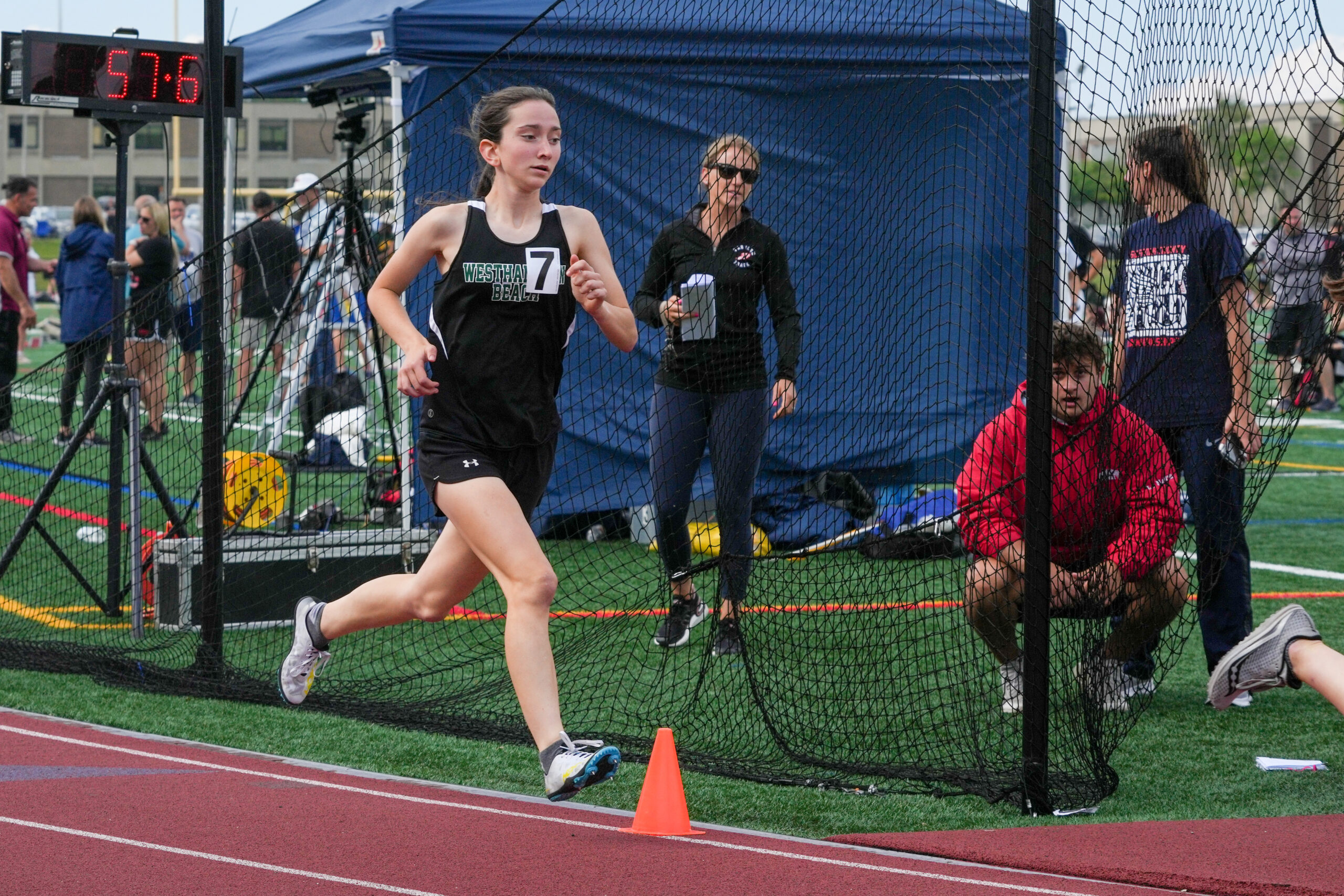 Lily Strebel races in the 1,500-meter run at the state qualifiers. RON ESPOSITO