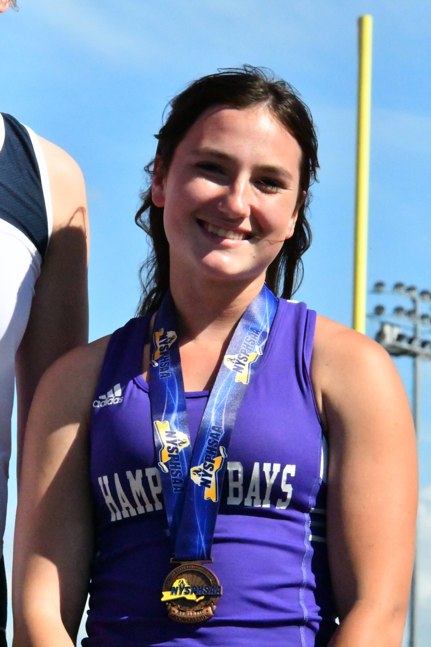 Maizie Poulakis of Hampton Bays made the podium and earned All-State honors in the pole vault. MICHELLE MALONE PHOTOS
