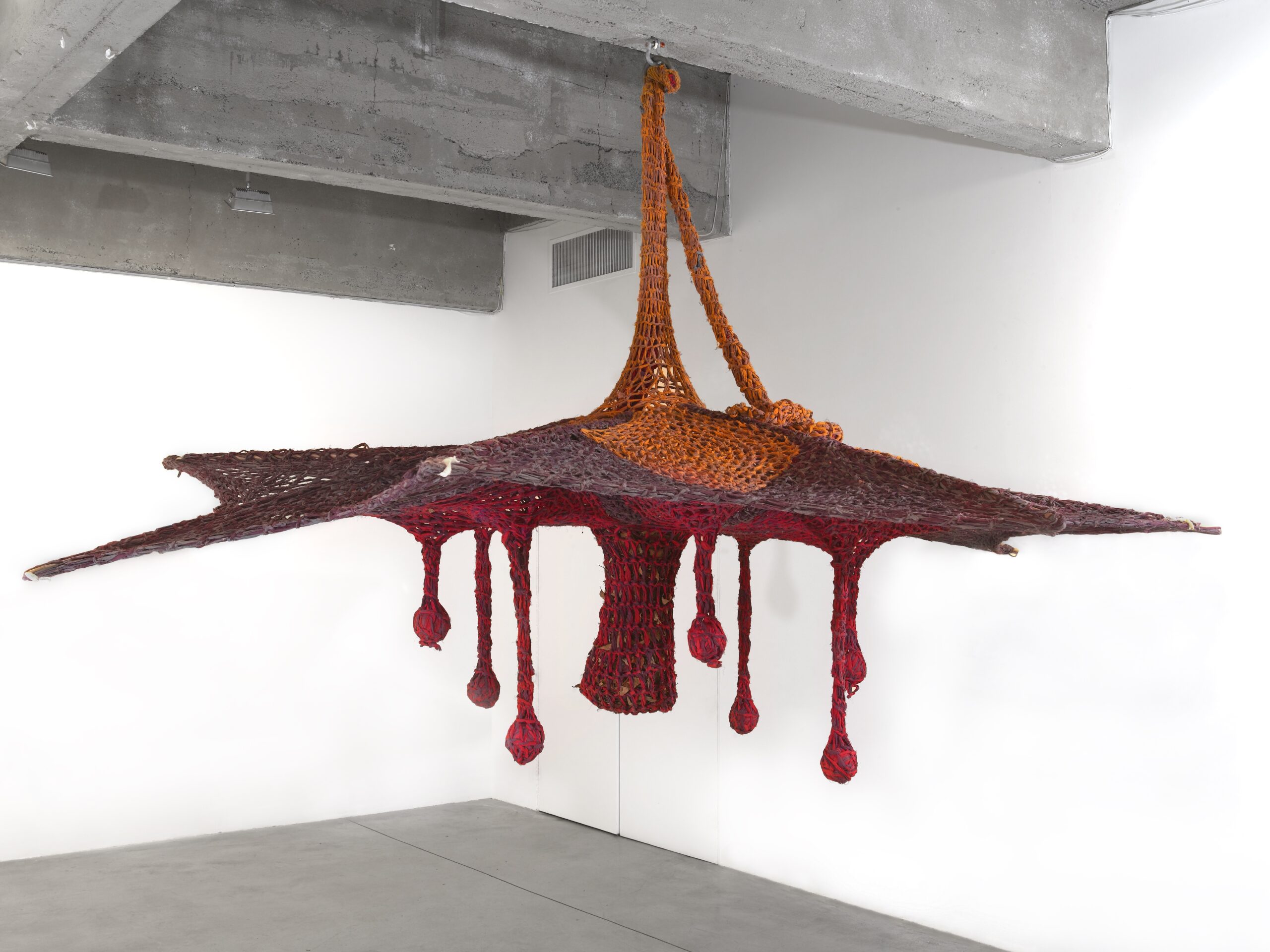 Ernesto Neto, “Winter Flower,” 2016. Cotton voile crochet, cotton voile thread balls, bamboo, semiprecious stones, wood and dry leaves, 138” x 147” x 148.” COURTESY OF THE ARTIST AND TANYA BONAKDAR GALLERY, NEW YORK/LOS ANGELES