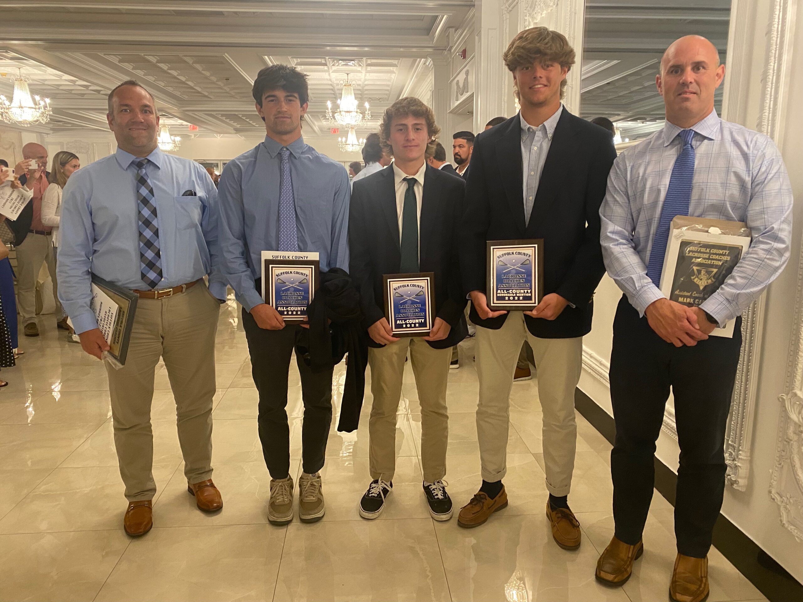 South Fork boys lacrosse team members and East Hampton sophomores Jack Cooper, Luke Castillo and Charles Corwin with head coach Matt Babb and assistant coach Mark Carlson. SOUTHAMPTON SCHOOL DISTRICT
