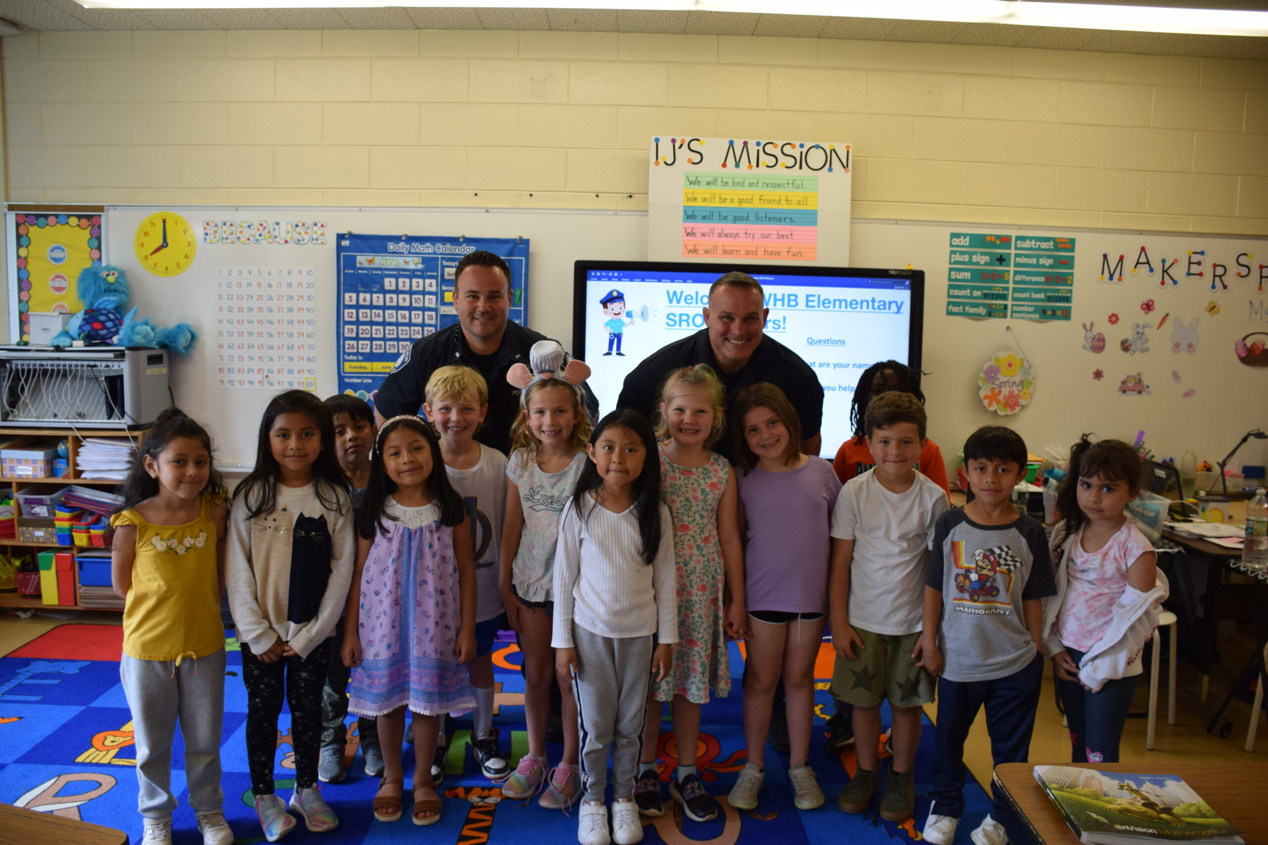 Westhampton Beach Elementary School students recently participated in a meet and greet with their school’s new school resource officers, Mark Yakabowski of the Westhampton Beach Village Police and Tony Vecchio of the Southampton Police Department. During the event, the officers visited each classroom, introduced themselves, and answered myriad questions from students about their jobs, favorite foods, favorite colors and more. COURTESY WESTHAMPTON BEACH SCHOOL DISTRICT