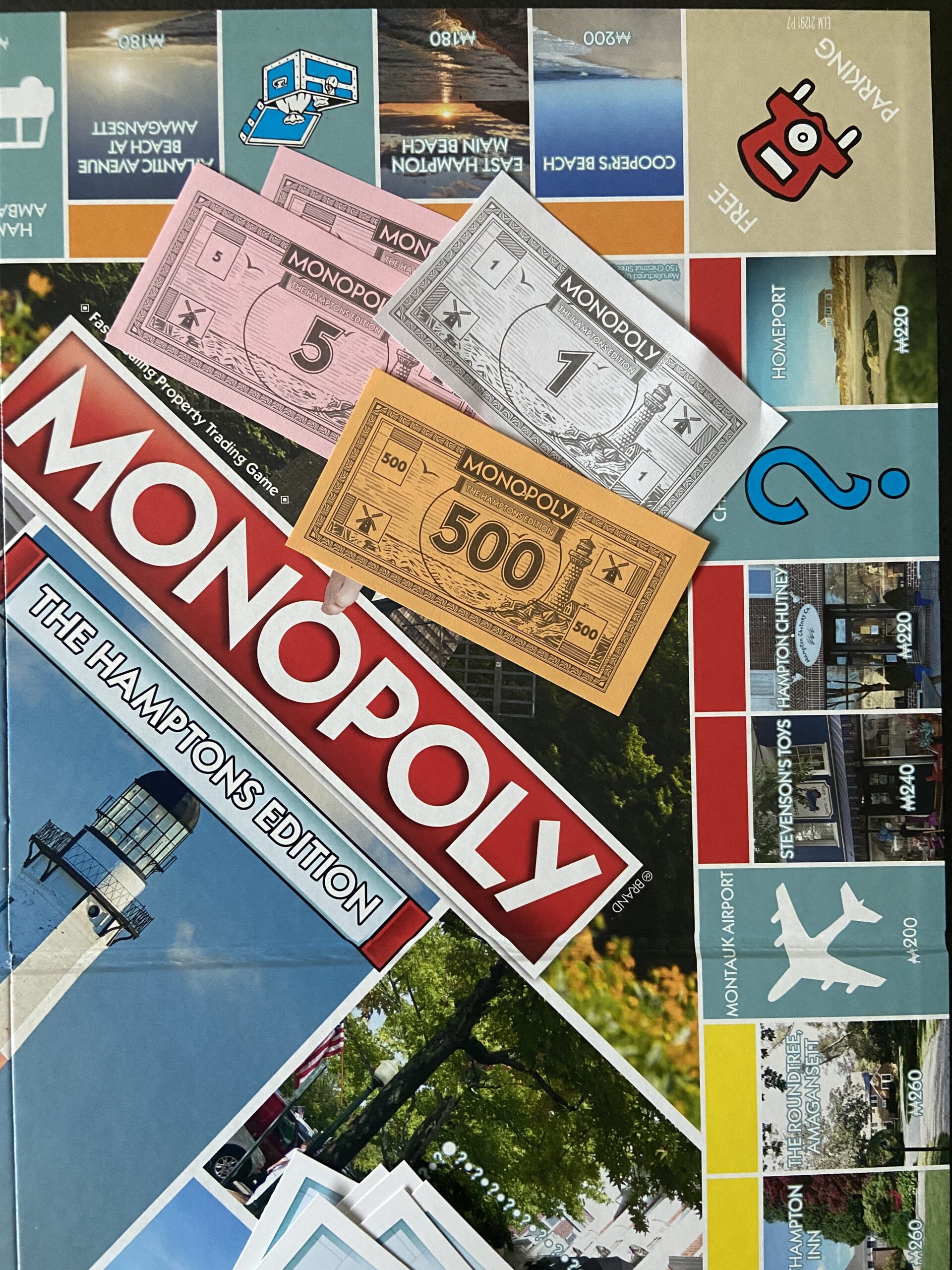 BY JULIA HEMING Hamptons Monopoly features its own money with a sketch of a lighthouse and windmills.