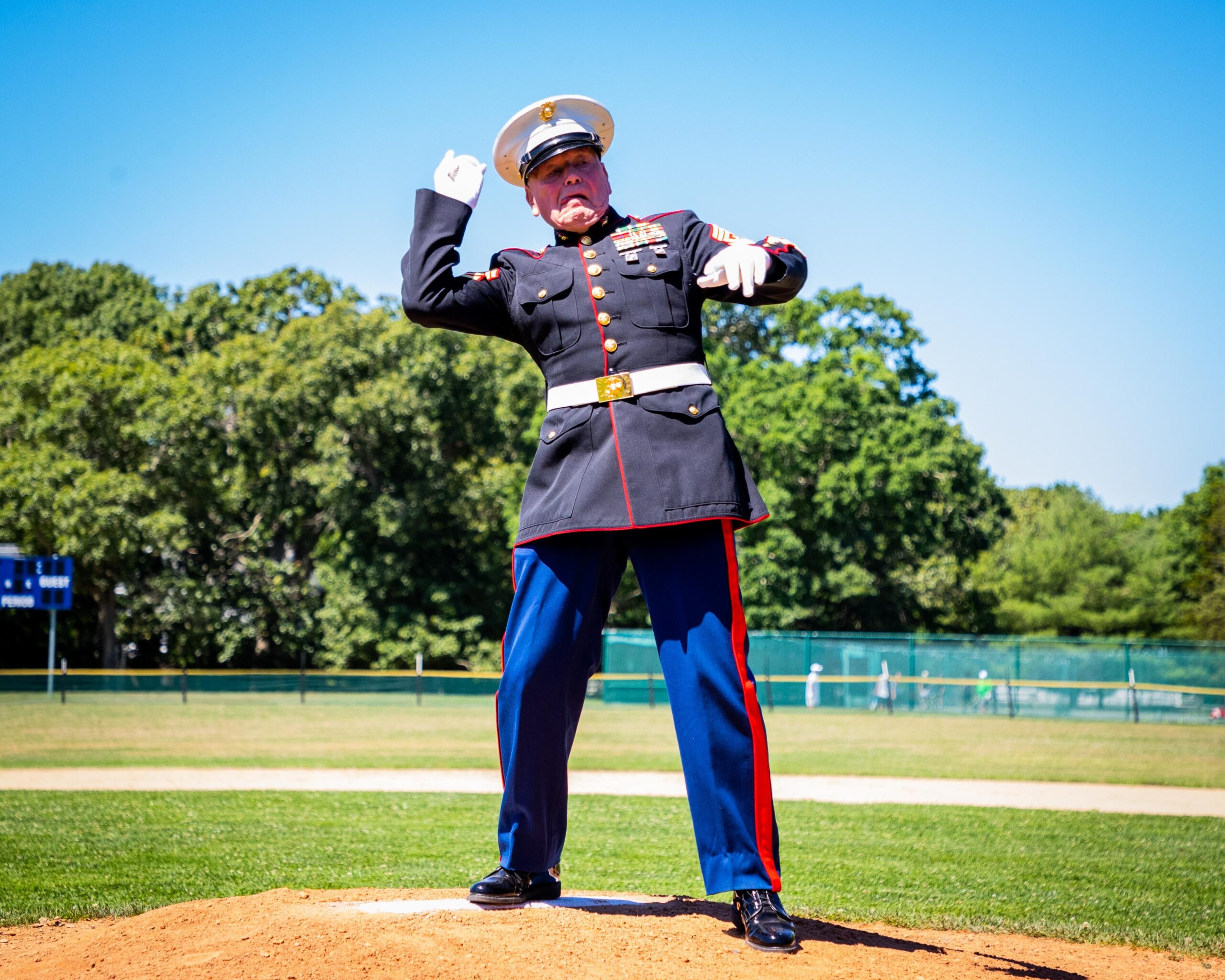 Retired marine Brian Carabine, a former host family for the Whalers, threw out Monday's first pitch.     DEMETRIUS KAZANAS