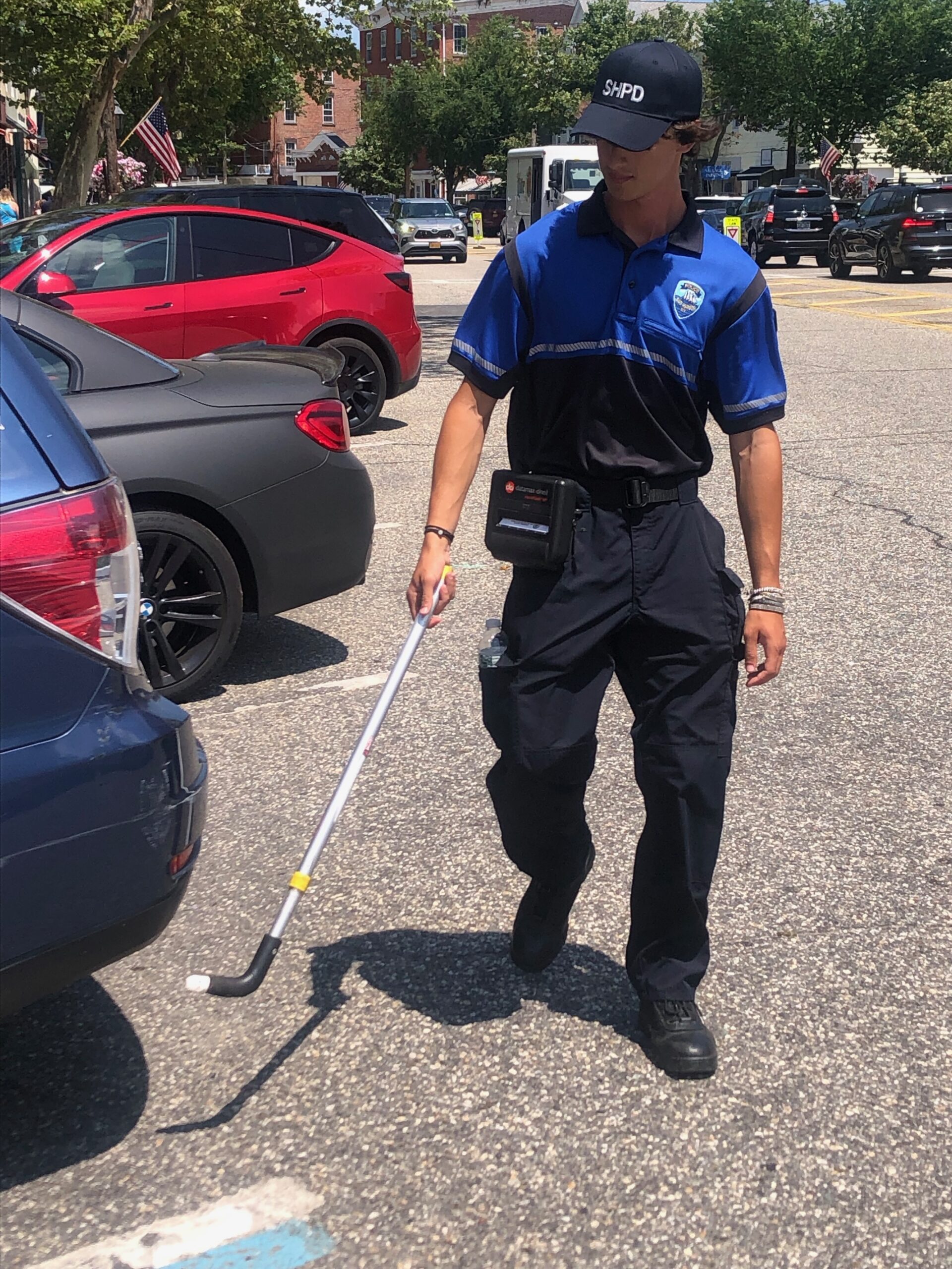 Sag Harbor Traffic Control Officer Daniel Bitton and fellow colleagues are subject to a variety of expletives and have even had drivers threaten to take them to court over parking tickets. Daniel is 17 years old. JENNY NOBLE