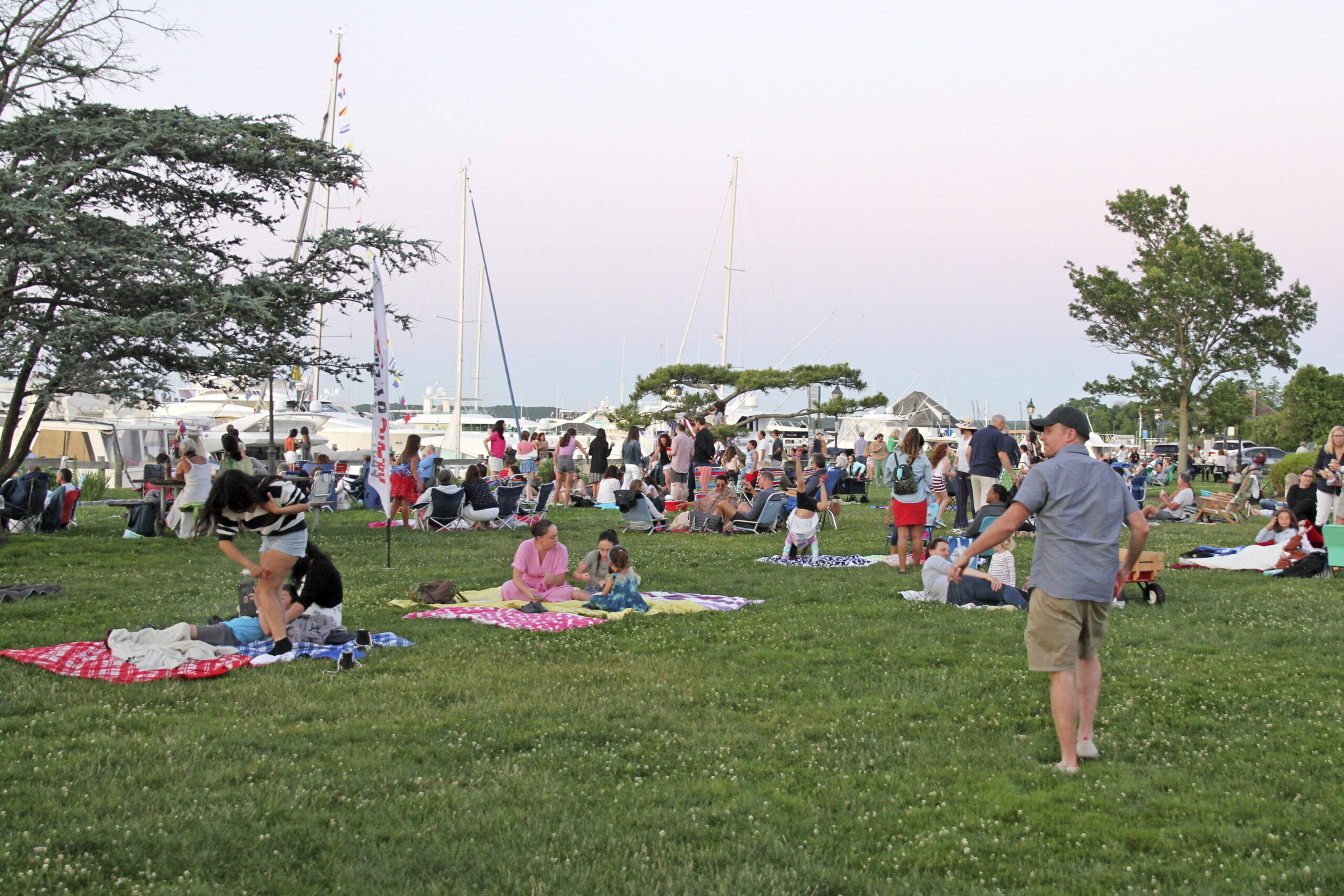 Folks gather in Marine Park to watch the fireworks on Sunday.