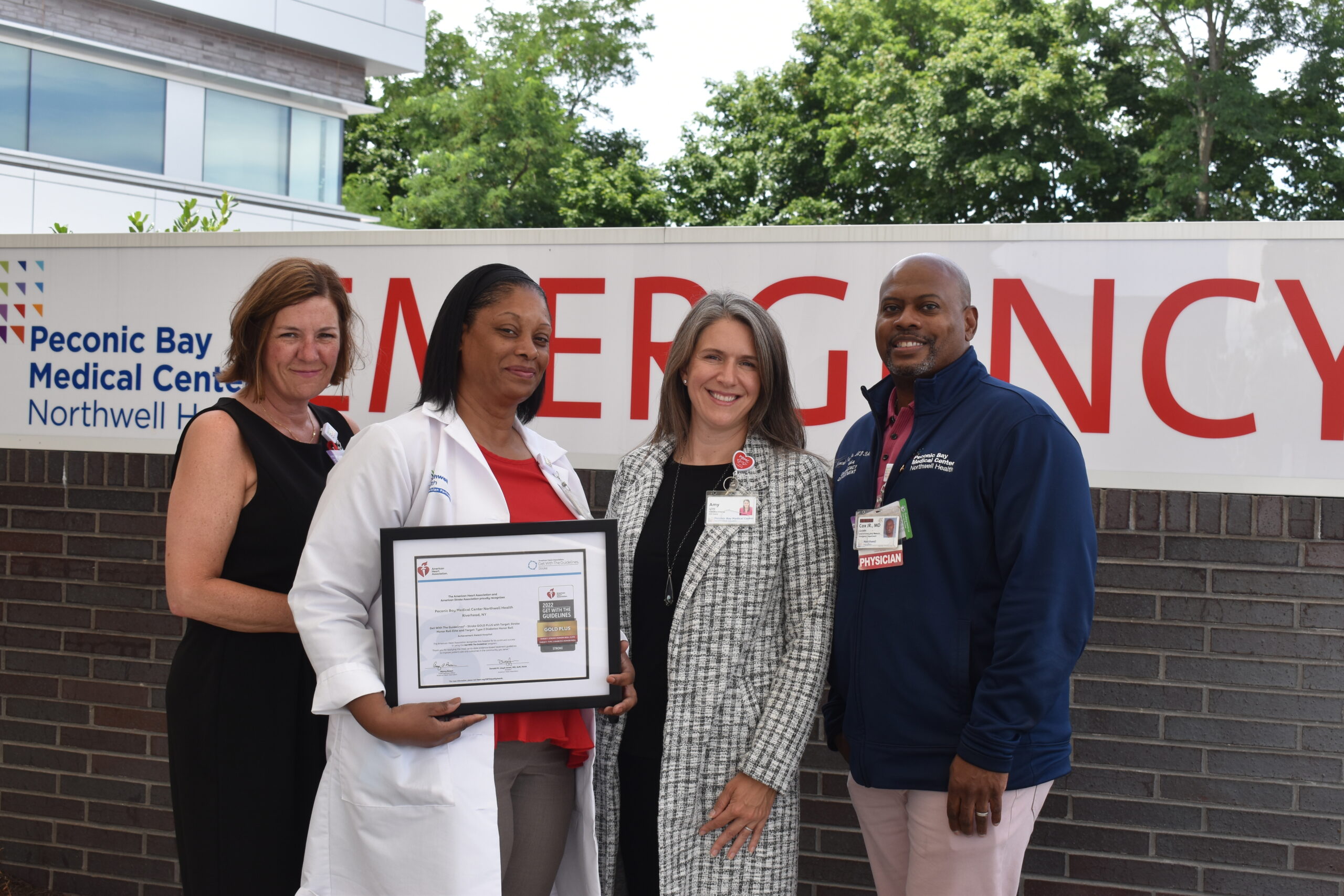 Peconic Bay Medical Center staff, from left,  MaryJo Stark, RN, Director, Patient Care, Emergency Service,; Donna Lyburt, MSN, RN, clinical program manager, stroke; Dr. Amy E. Loeb, executive director; Dr. Lincoln Cox, chair, Emergency Medicine. COURTESY PECONIC BAY MEDICAL CENTER