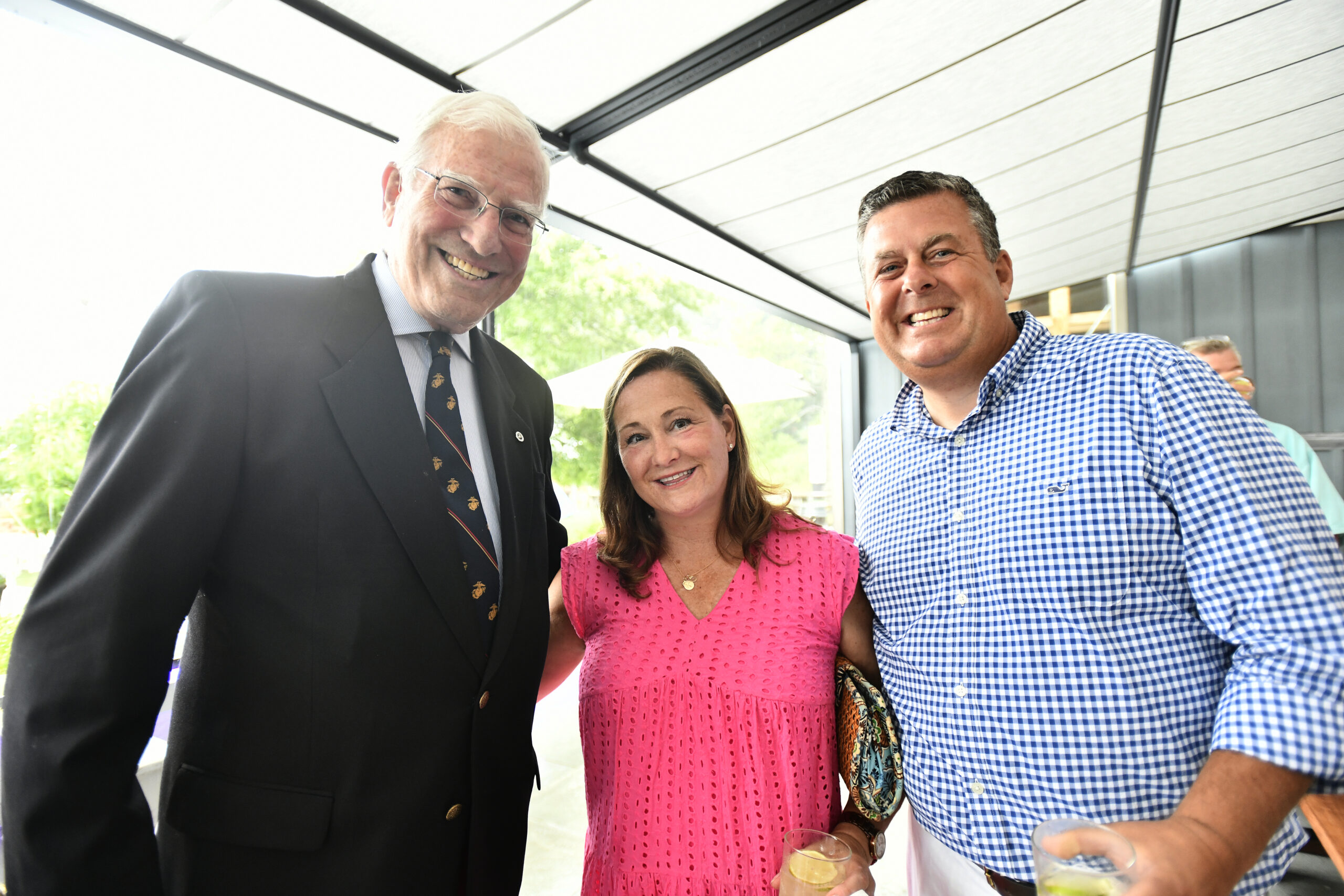 Martin Gilmartin with Joe and Kelly Zaffuto at the Honor Flight Long Island Listen To The Wind gala on Saturday evening at the Sagaponack Farm Distillery.  DANA SHAW