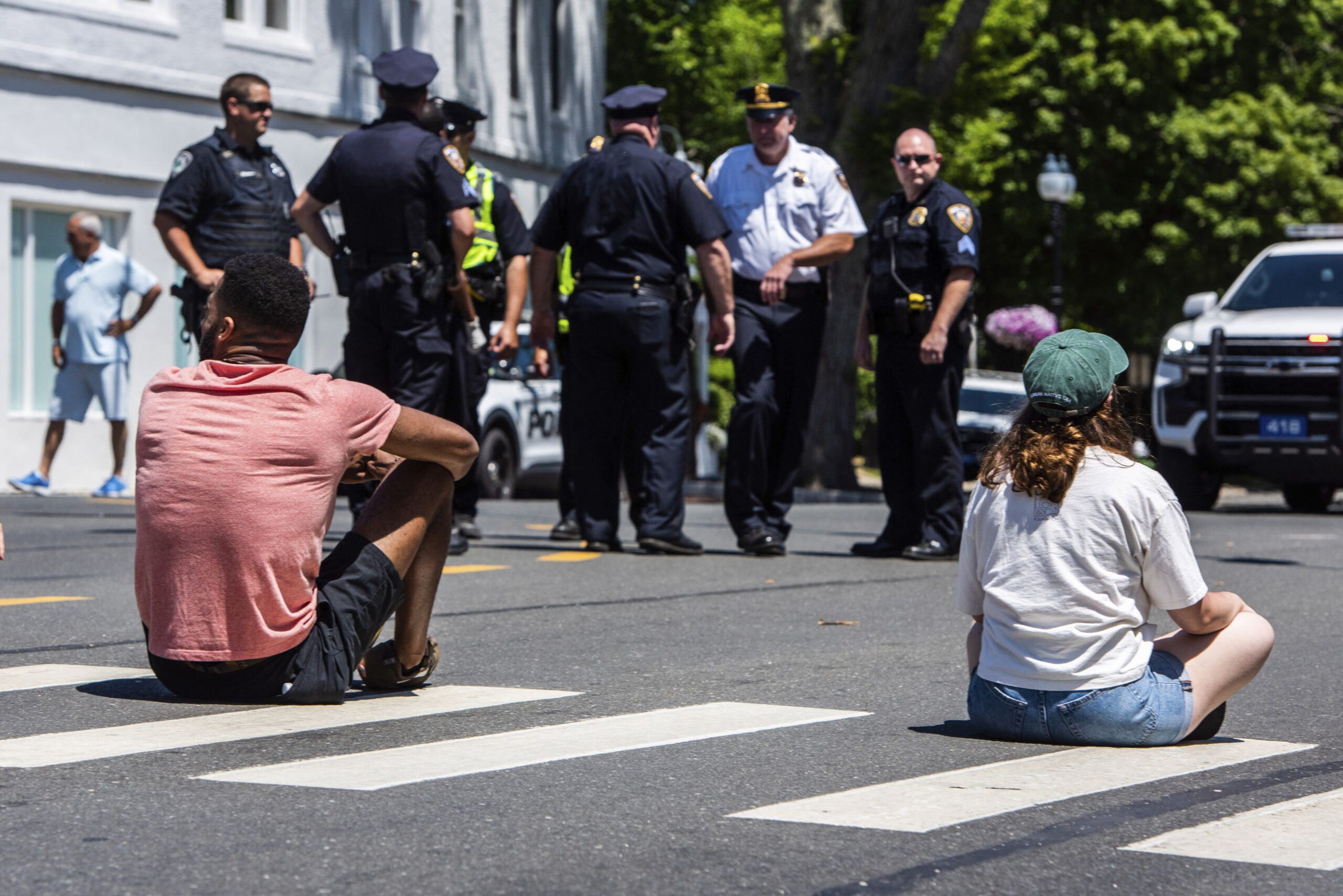 Roving Protesters, Calling For Higher Taxes On The Rich, Block Traffic