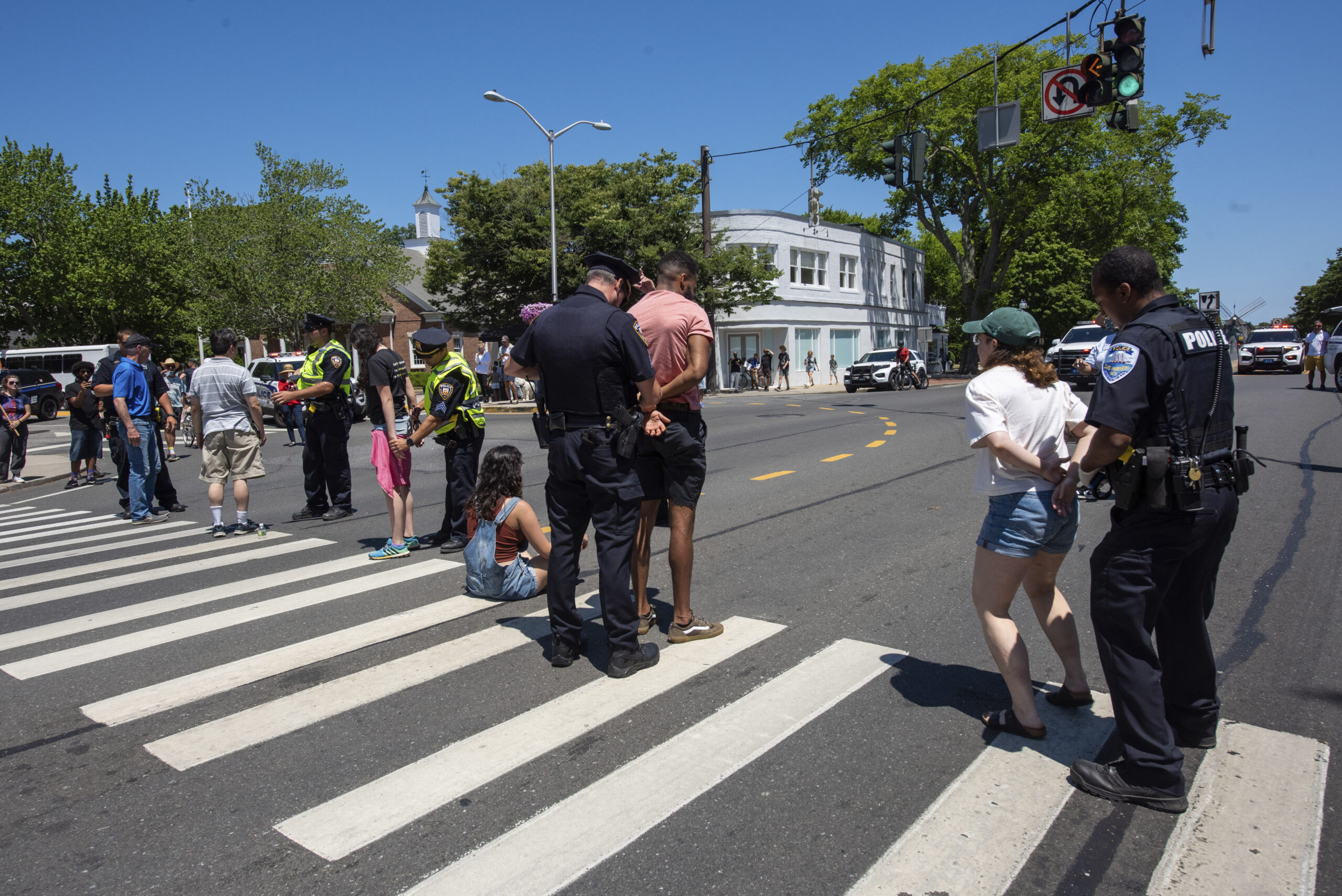 Roving Protesters, Calling For Higher Taxes On The Rich, Block Traffic