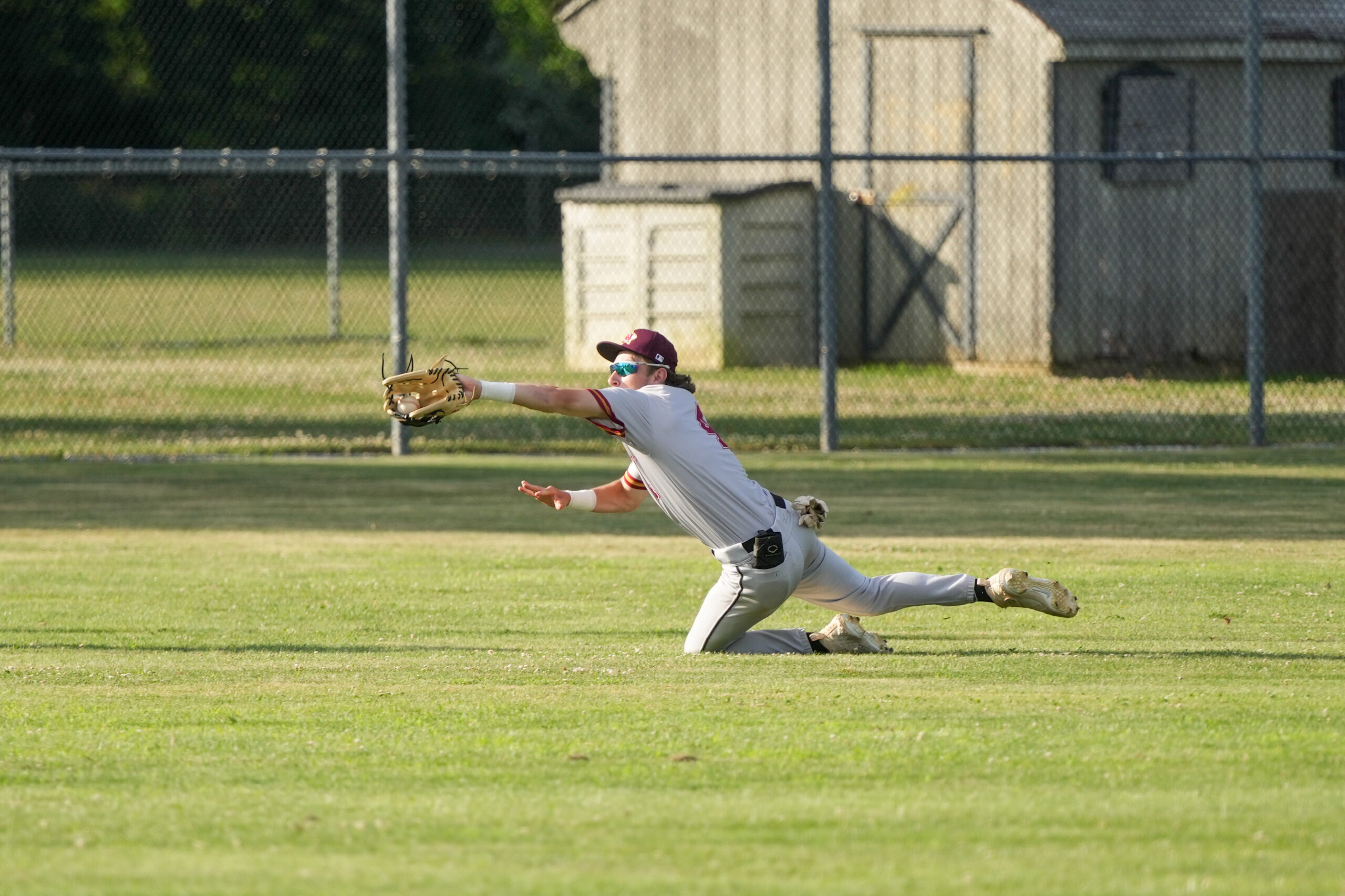 Red Team All-Star outfielder Ty Orologio (Riveread/Ulster) makes a diving catch.  RON ESPOSITO